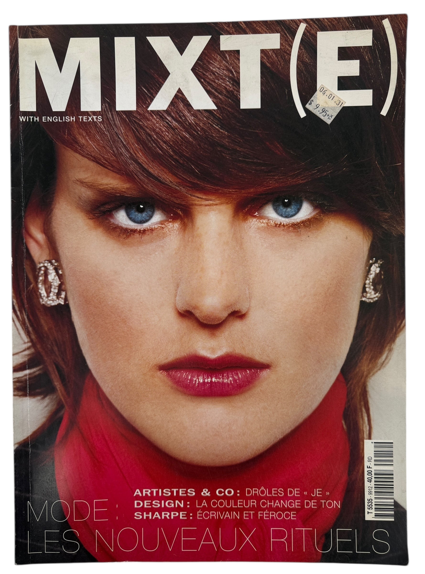 Magazine cover with a woman's face and text, featuring the brand 'MIXT(E)'. No 8. 