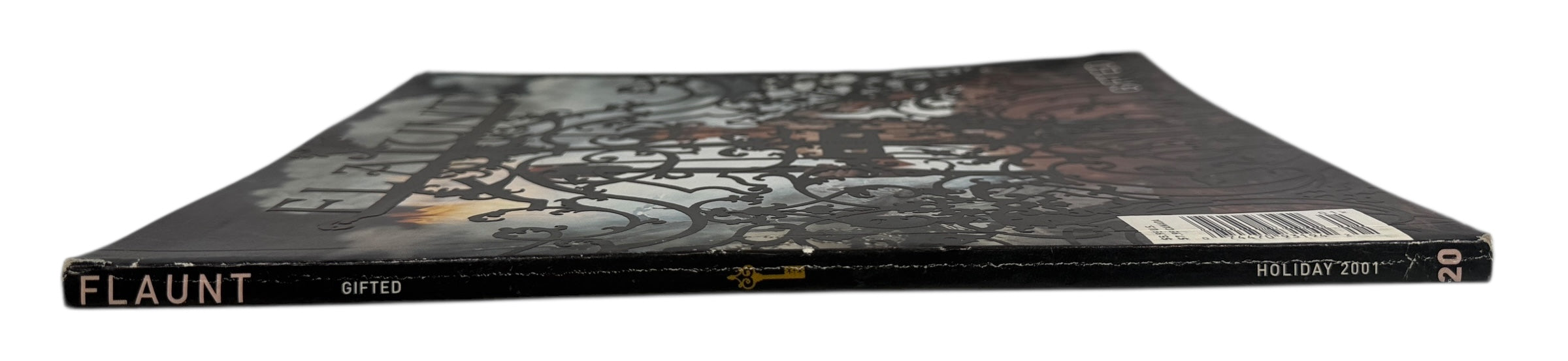 Magazine cover with 'Flaunt' branding on a white background. Holiday 2001 