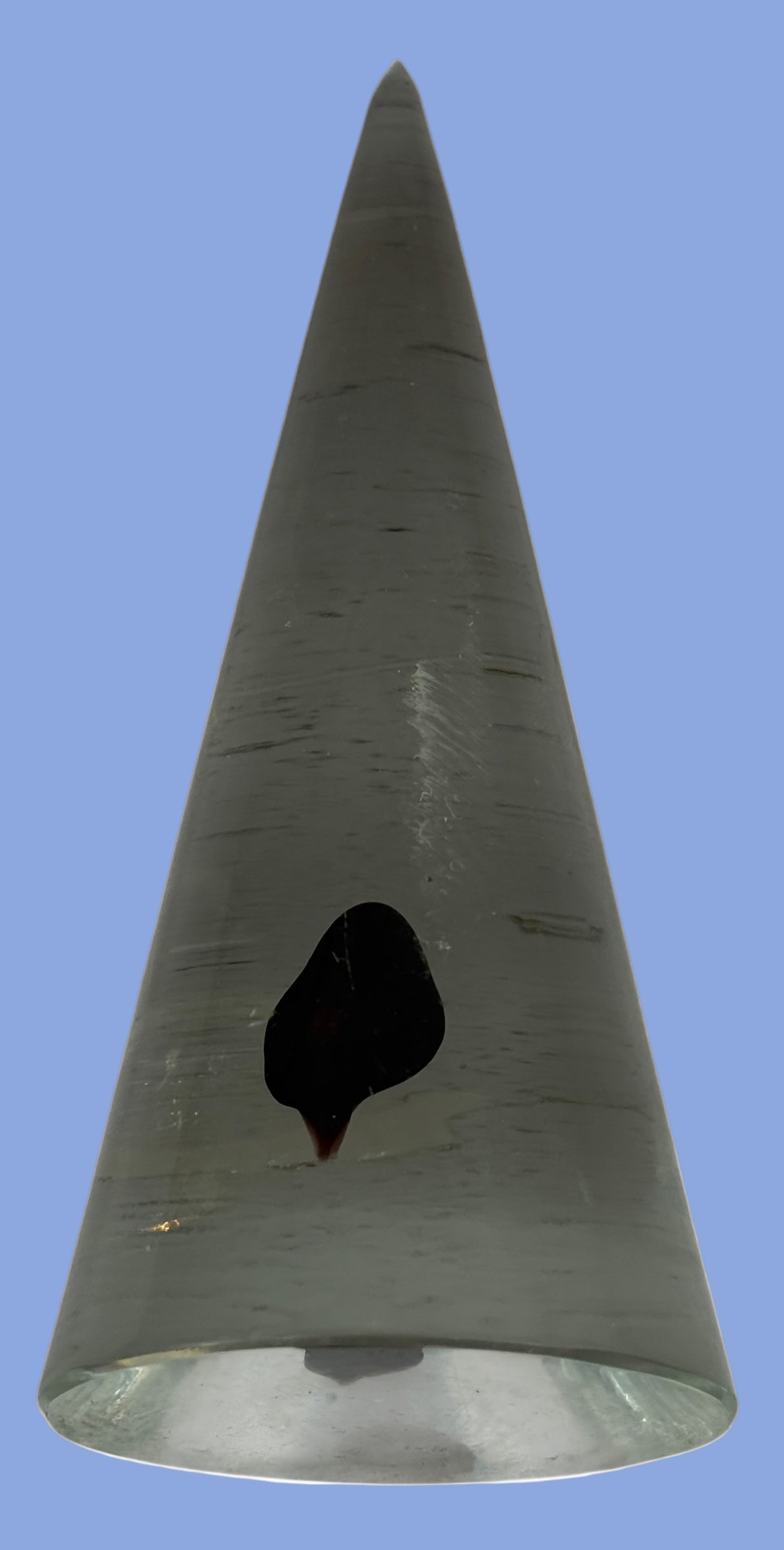 Vintage clear glass cone paperweight with dark red-brown inclusion. Mid-century modern décor collectible, polished base, unsigned art glass accent.