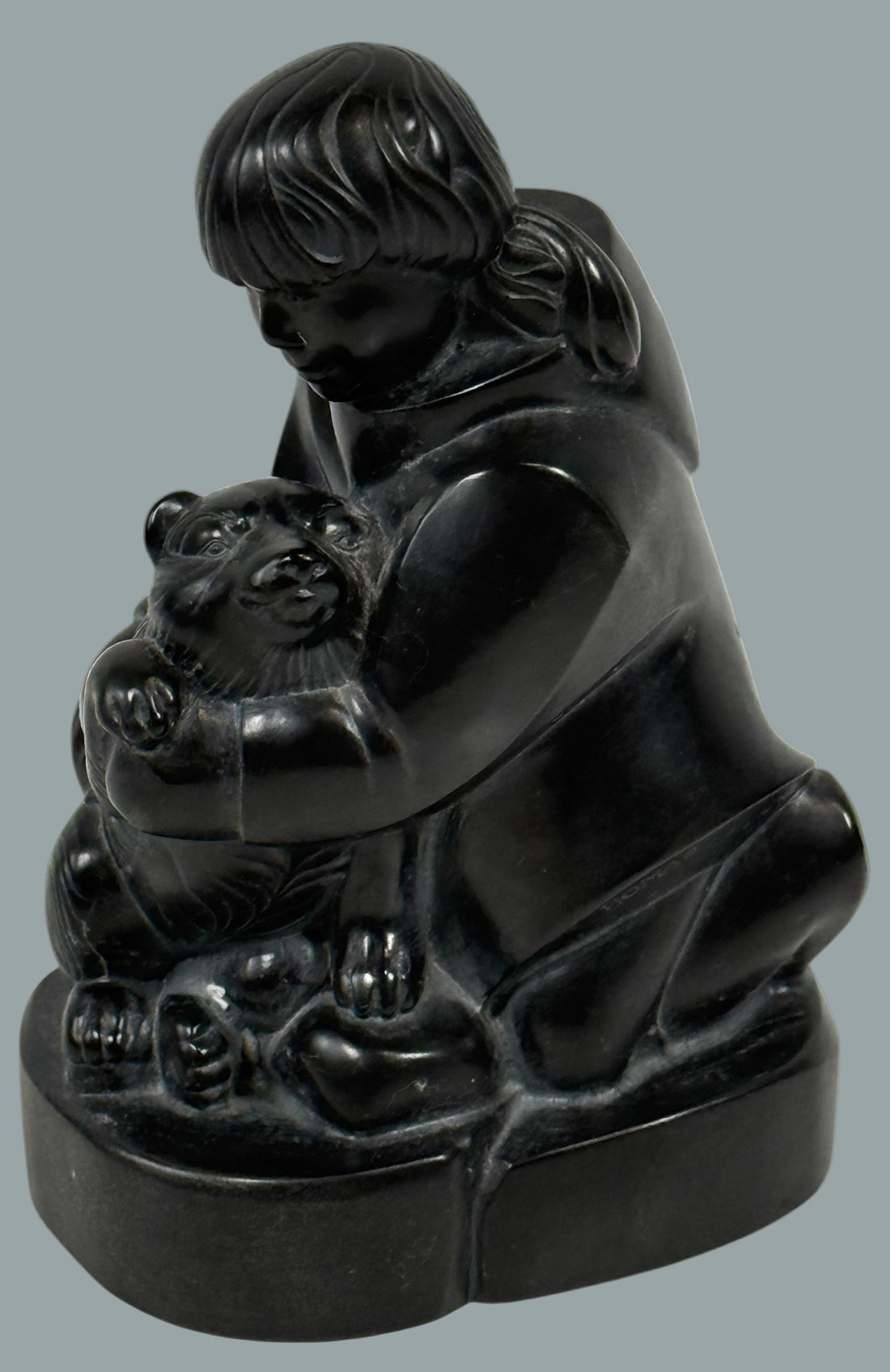 Signed BOMA Canada soapstone carving by McPhee, “Boy with Dog” Inuit-style polished black stone sculpture