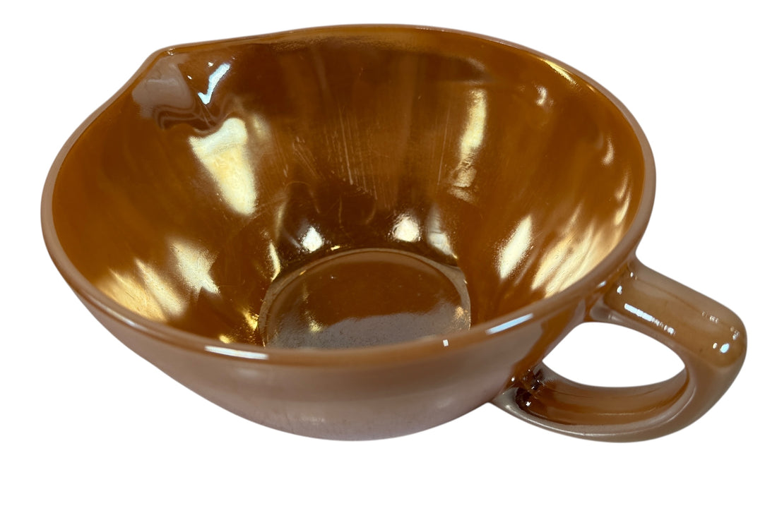 Vintage Fire-King Peach Luster mixing bowl with handle &amp; spout. Classic 1950s oven-proof milk glass collectible. Perfect for retro kitchens or display.