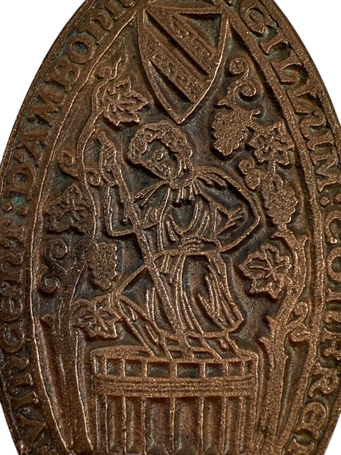 Vintage brass pendant of vintner treading grapes, medieval-seal style, 3″ statement medallion, European wine-guild reproduction, mid-century charm.