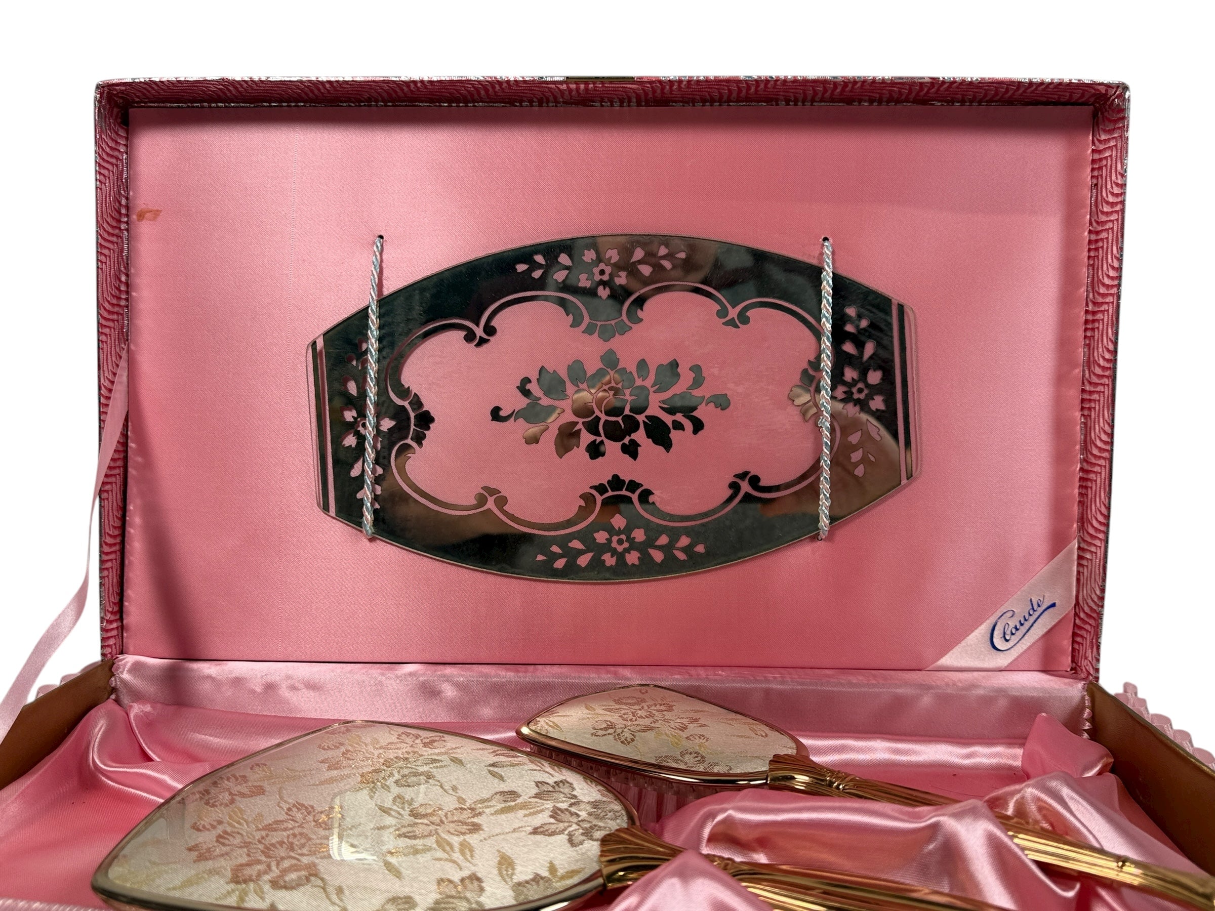 Vintage Claude vanity set with mirror, brush &amp; comb in original pink satin box. Elegant 1950s dressing table décor collectible.