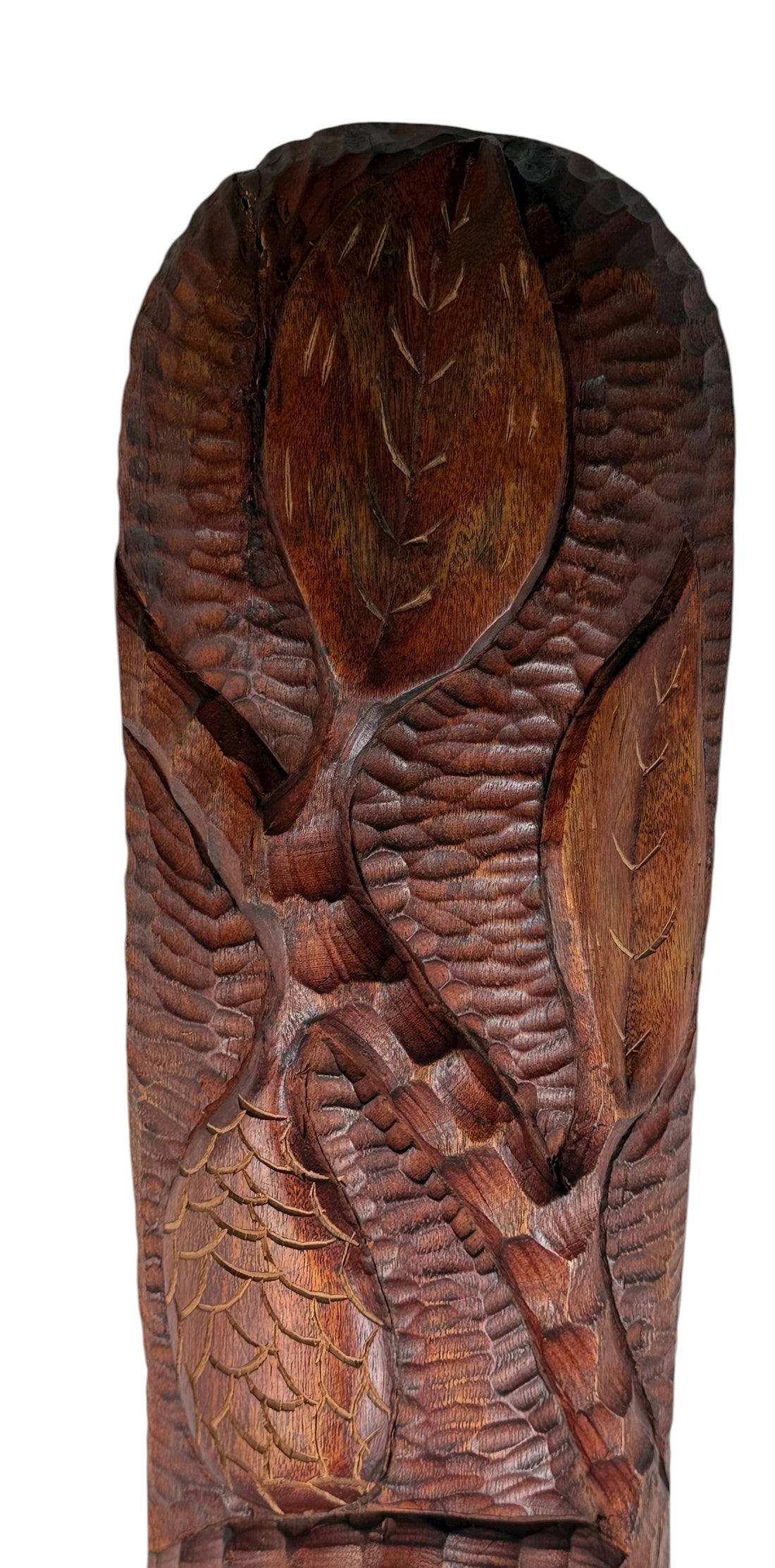 Wooden sculpture of a bird with detailed carvings on a white background