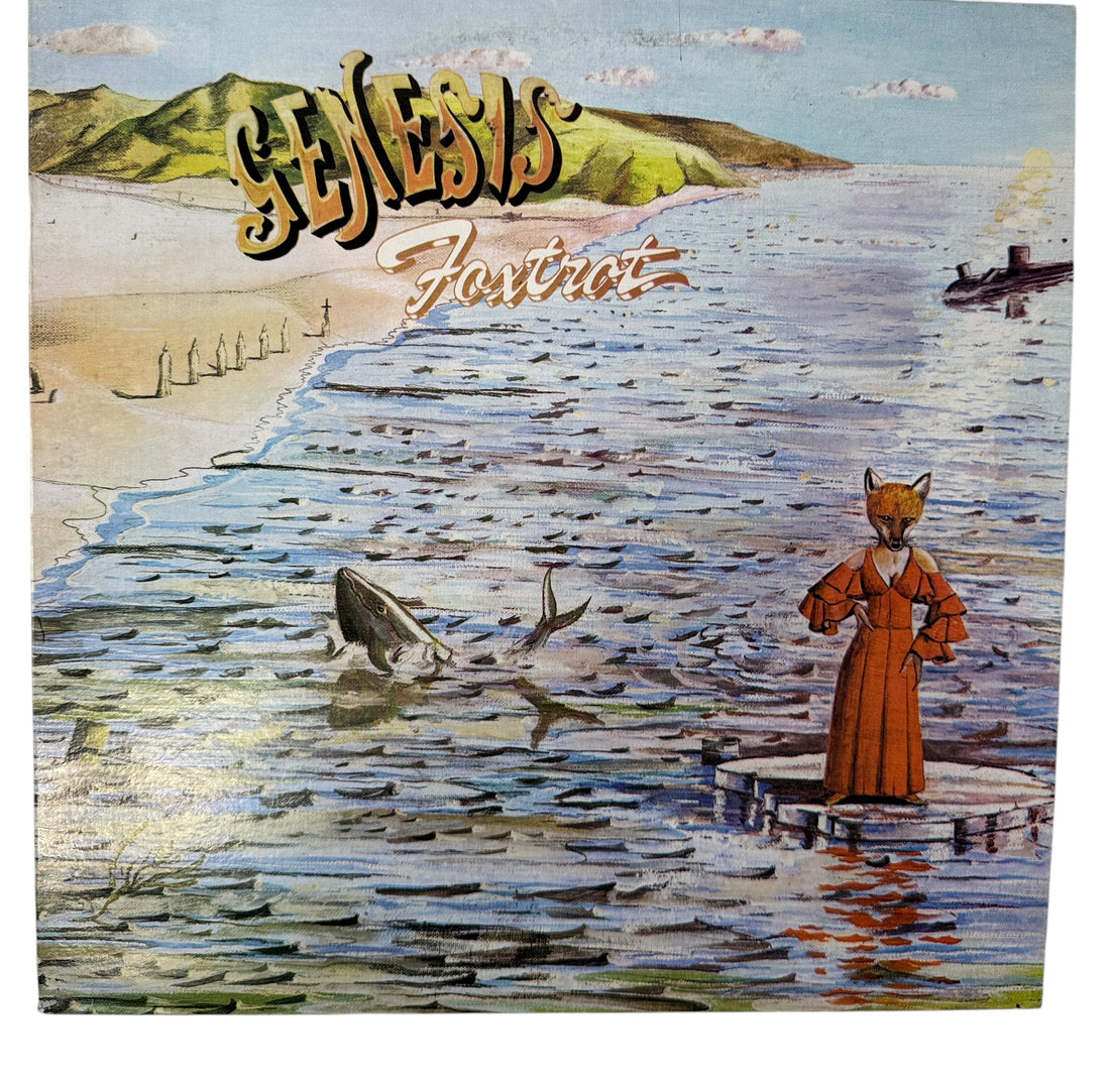 Genesis Foxtrot 1972 U.S. Charisma pressing, pink Mad Hatter label. VG+ vinyl and sleeve. Progressive rock classic featuring “Watcher of the Skies.”
