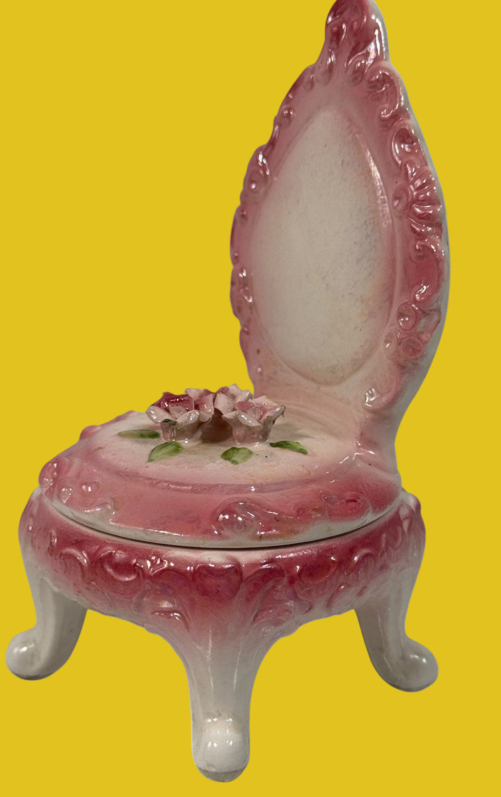 Vintage 1950s Japanese porcelain trinket box shaped like a chair with pink roses and ornate detailing. Ideal for vanity décor or small jewelry storage.