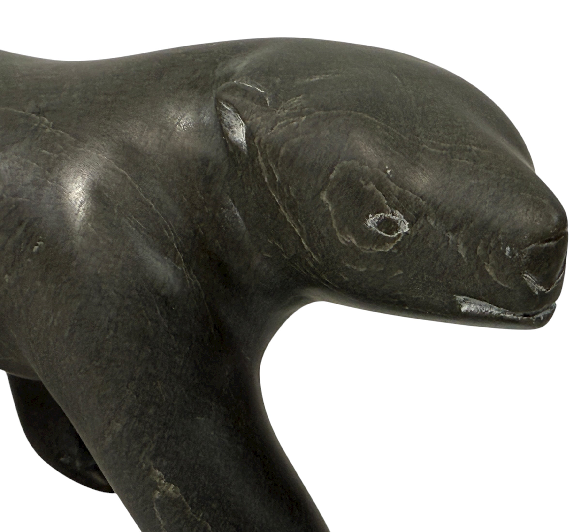 Signed Inuit soapstone bear by Joe Ittukalak (2004) from Nunavik. 10-inch Canadian carving in dark stone—authentic Indigenous art sculpture.