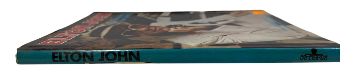 Vintage 1976 Elton John photo biography by Tatham & Jasper, Octopus Books. 100+ color photos of the Rocket Man in his prime. Collectible 70s music book.