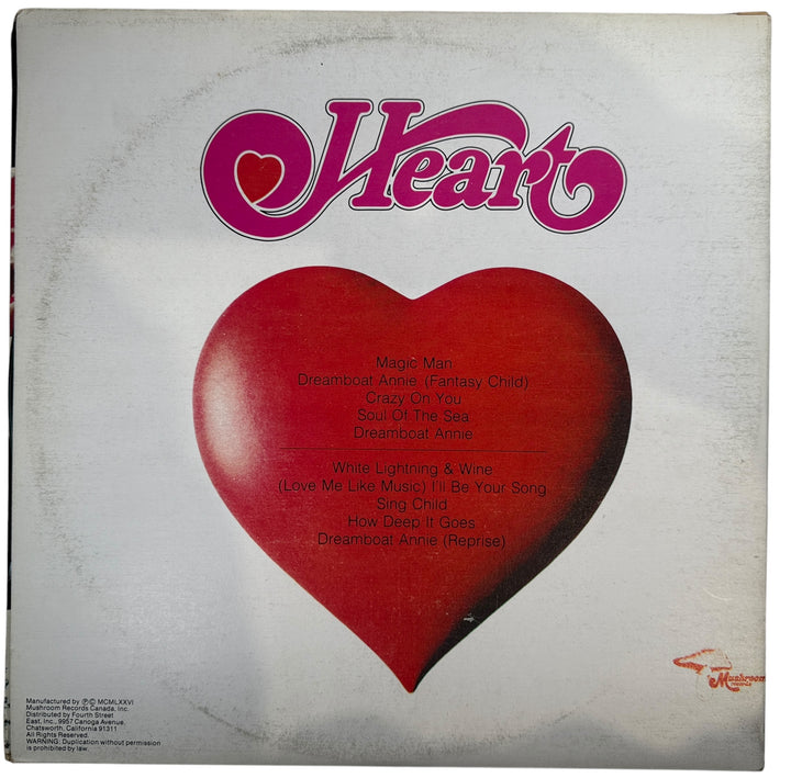 Vintage 1975 Heart Dreamboat Annie Canadian LP on Mushroom Records. Gatefold pressing with classic tracks. Clean collectible copy for rock vinyl fans.