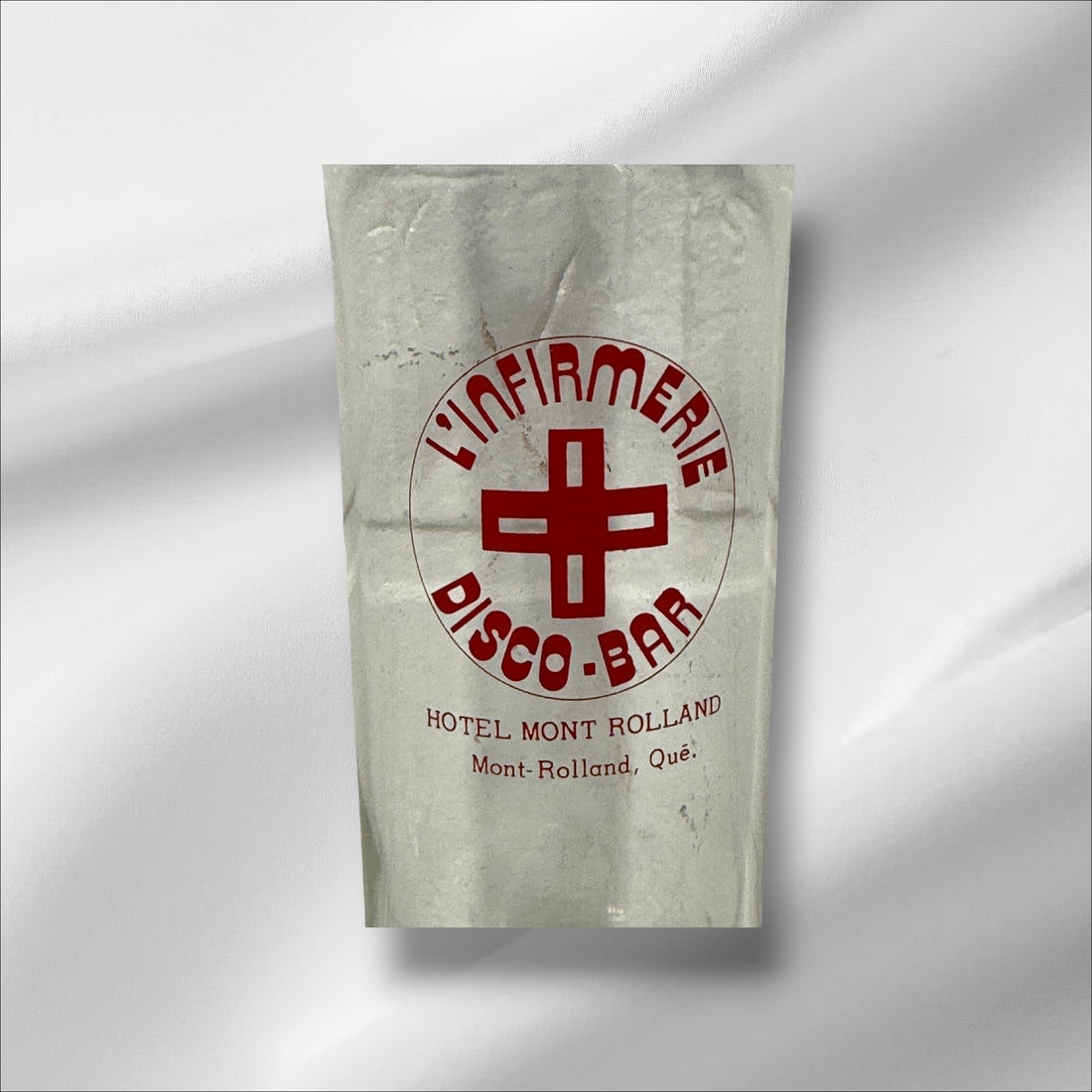 Vintage L’Infirmerie Disco-Bar souvenir glasses from Mont-Rolland, Québec. Rare nightlife memorabilia in excellent condition. Pair of original high-ball glasses.