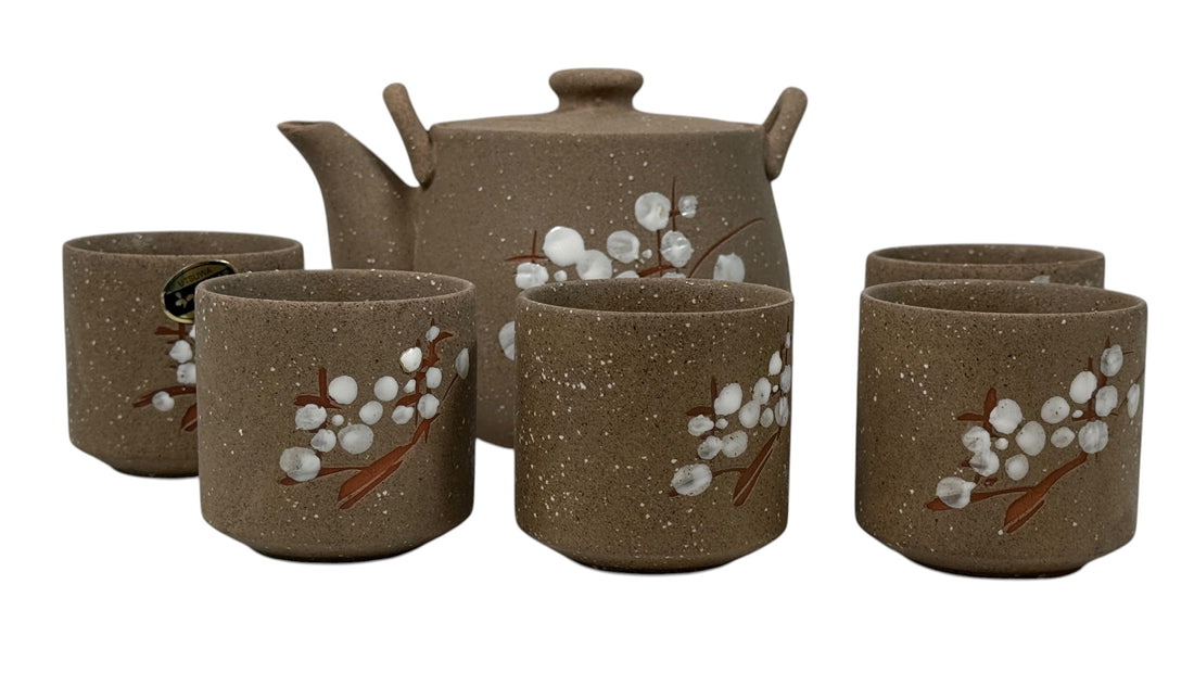 UTSUWA Japan stoneware tea set with plum blossom design, boxed with teapot and six cups. Excellent condition. Great Japanese ceramic gift set.