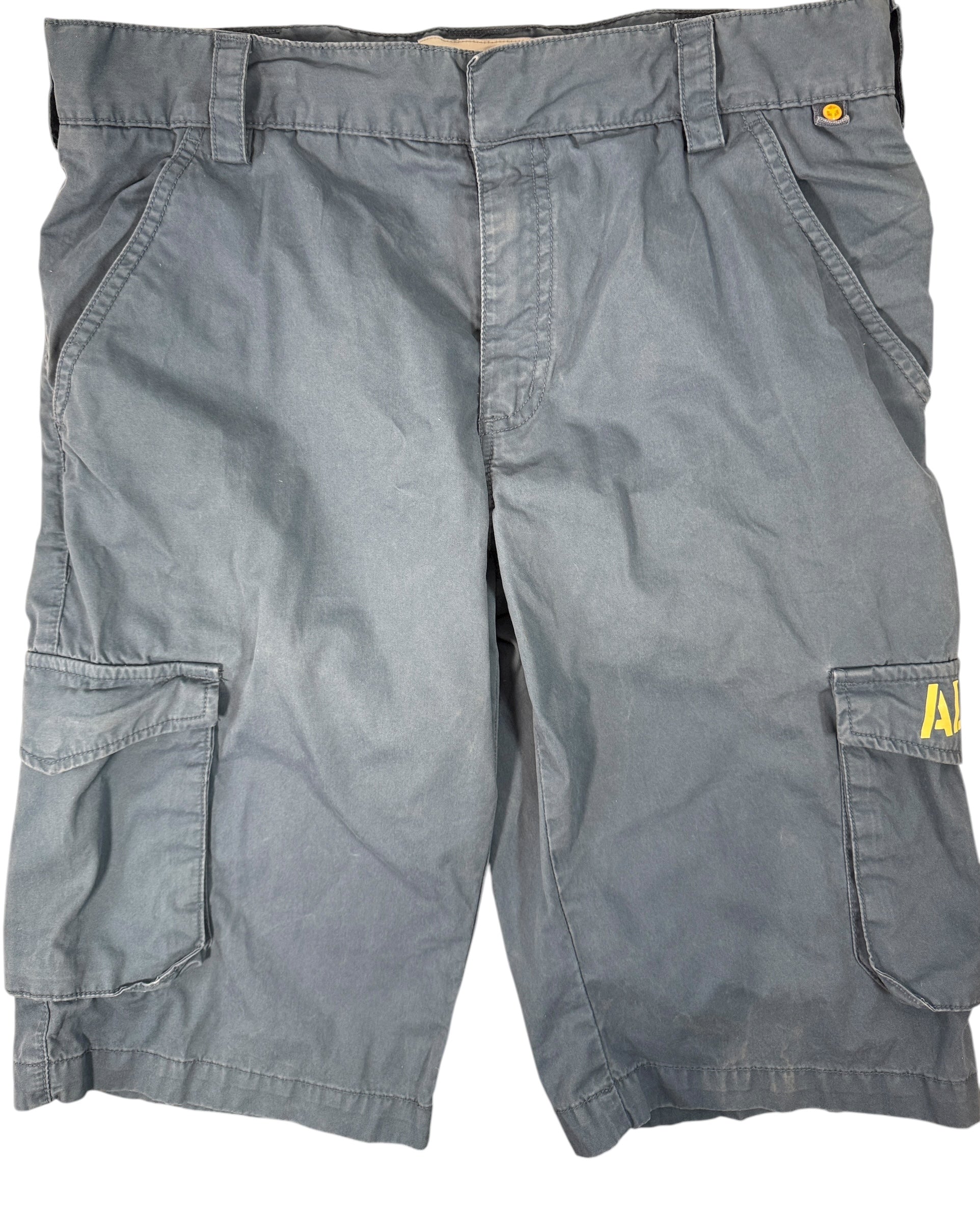 Authentic Resident Evil S.T.A.R.S. cargo shorts with official Capcom tags. Rare mid-2000s game merch in great condition. Ideal for collectors and fans.
