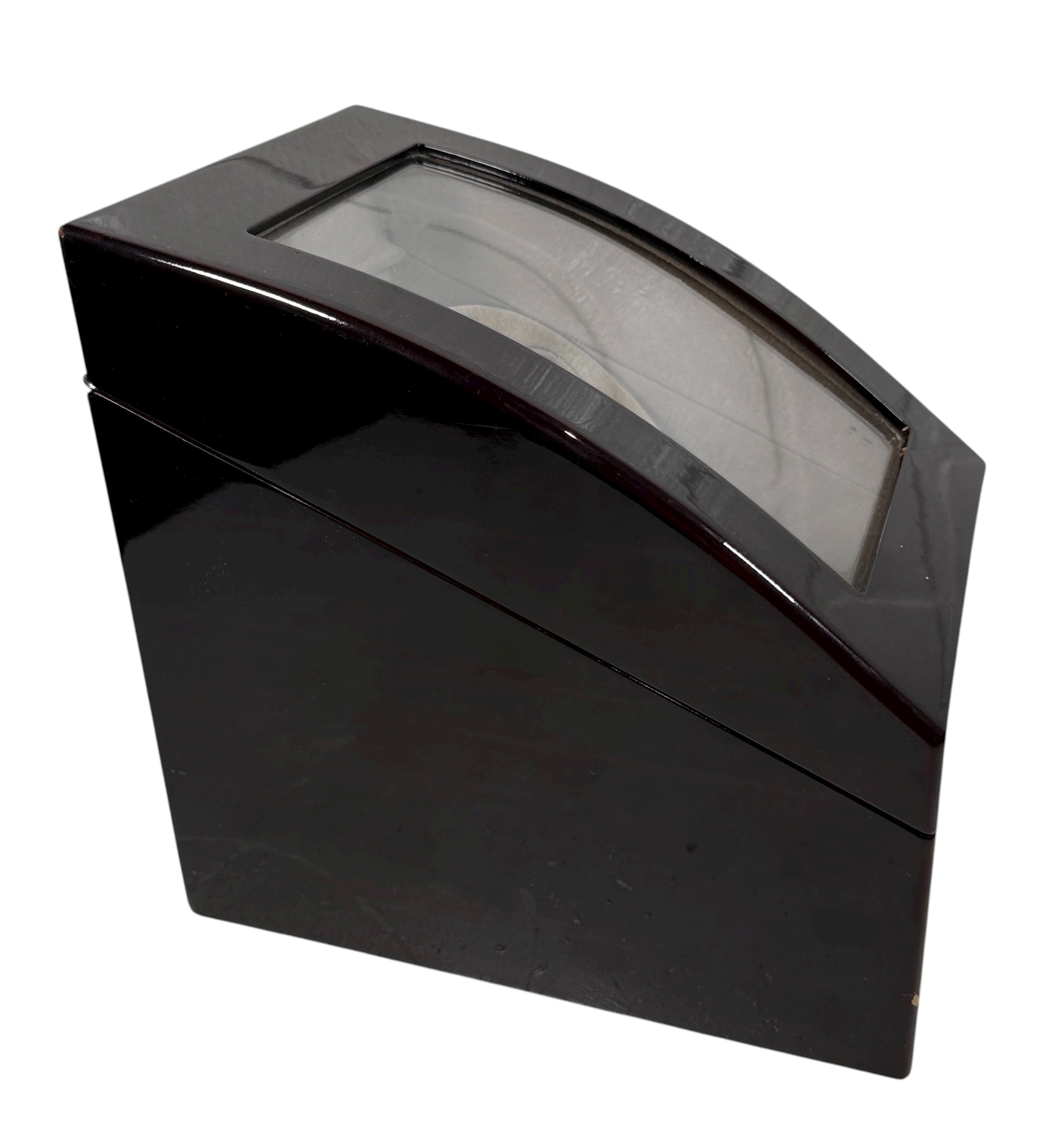 Working dual automatic watch winder in piano black lacquer with storage, display lid, and AC adaptor. Clean, functional, and perfect for protecting your watches.