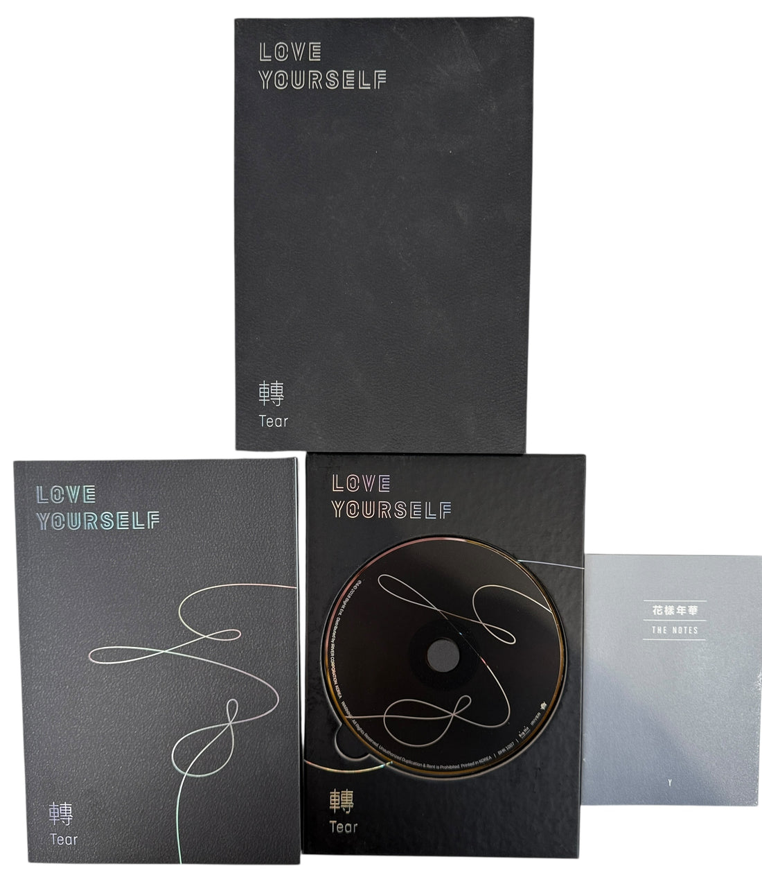 2018 BTS Love Yourself Tear album. Official Big Hit release with CD, photobook and inserts. Complete, clean copy. Ships from Canada.