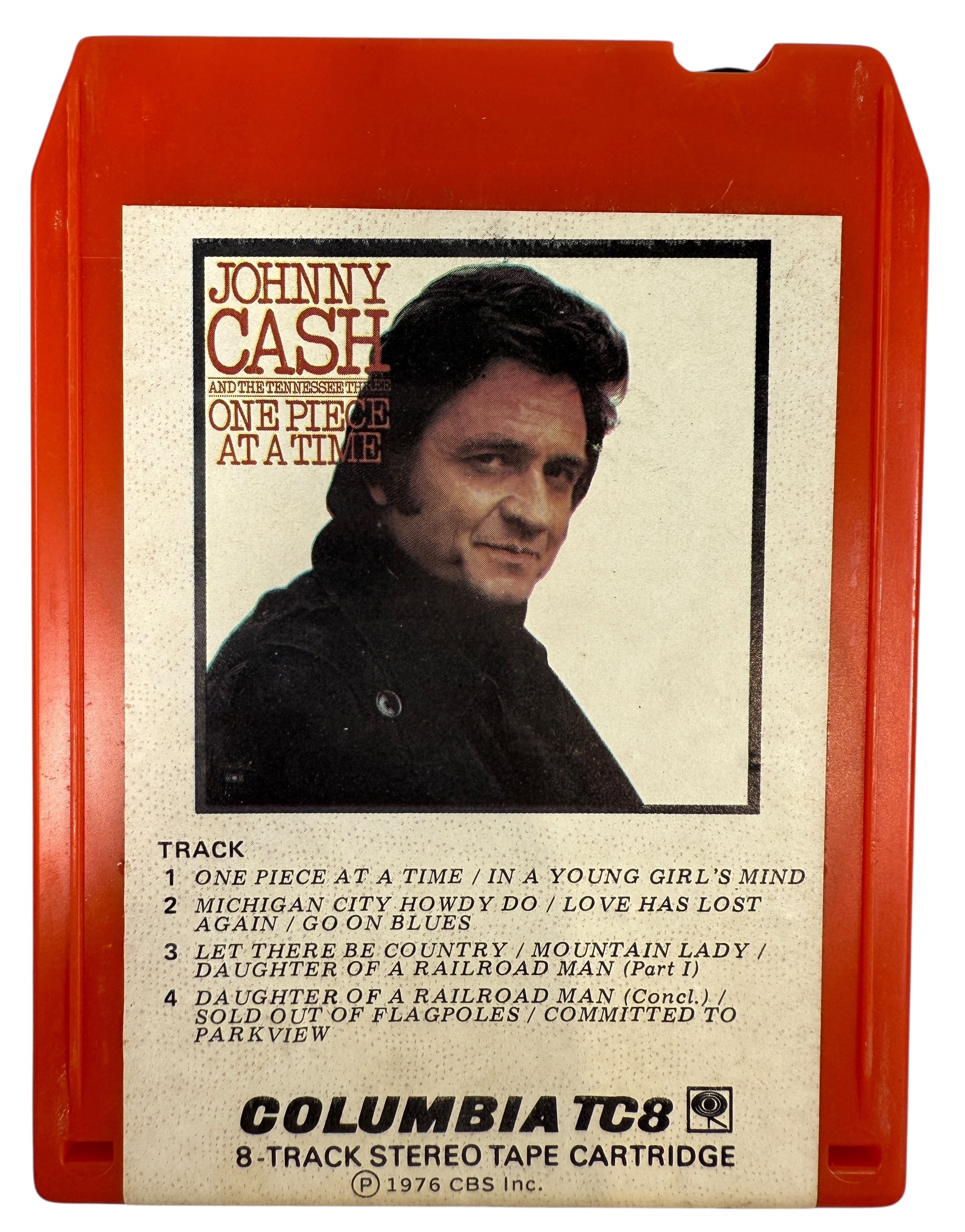 1976 Johnny Cash One Piece at a Time Columbia TC8 8-track tape. Red shell, clean label, collectible outlaw country format. Vintage audio for fans and collectors.