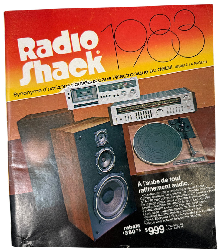 1983 Radio Shack French-Canadian catalog with TRS-80 and Realistic hi-fi ads. Retro computing &amp; audio collectible in Very Good vintage condition.