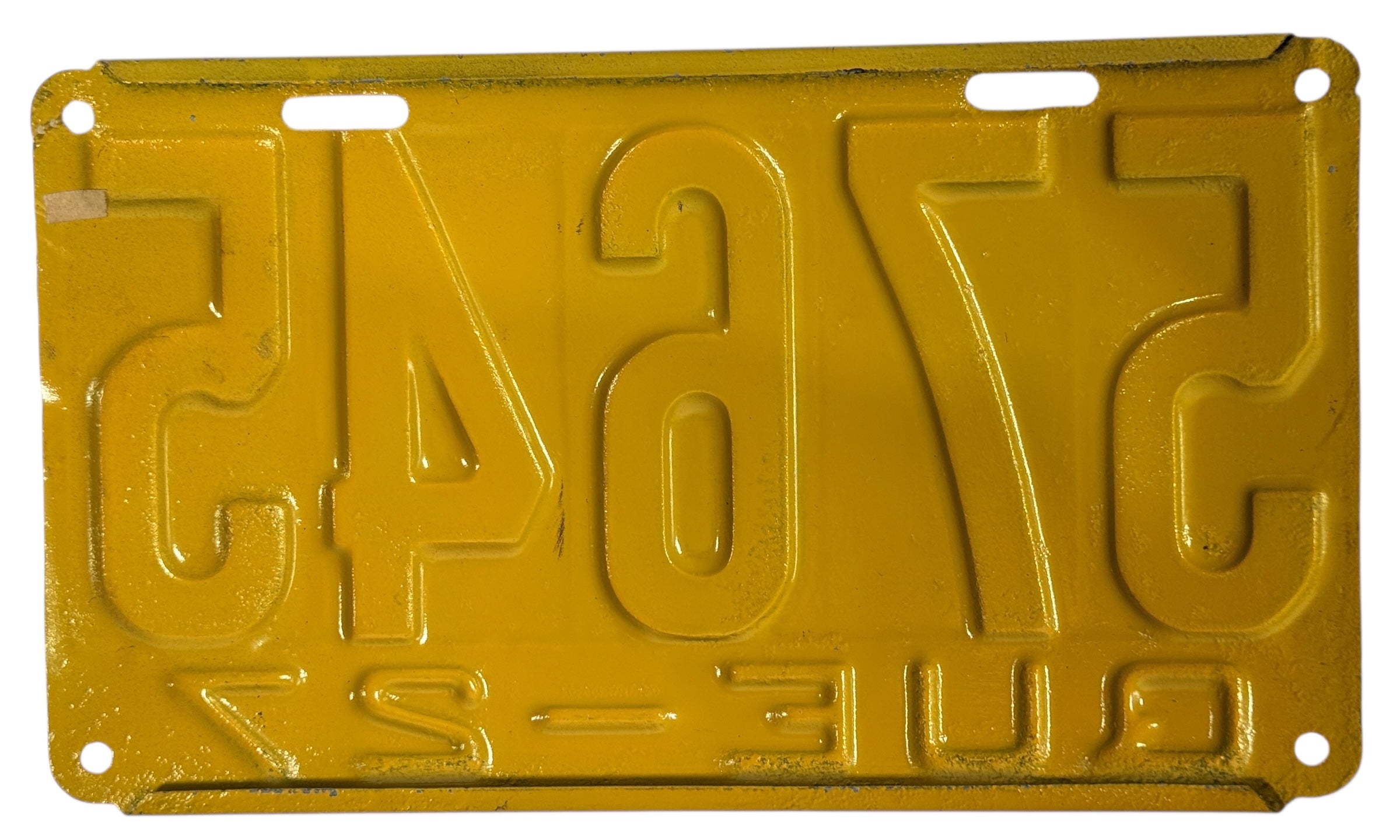 Vintage 1927 Quebec license plate restored in yellow and black. Steel embossed automobilia décor for garage, bar or man-cave. 
