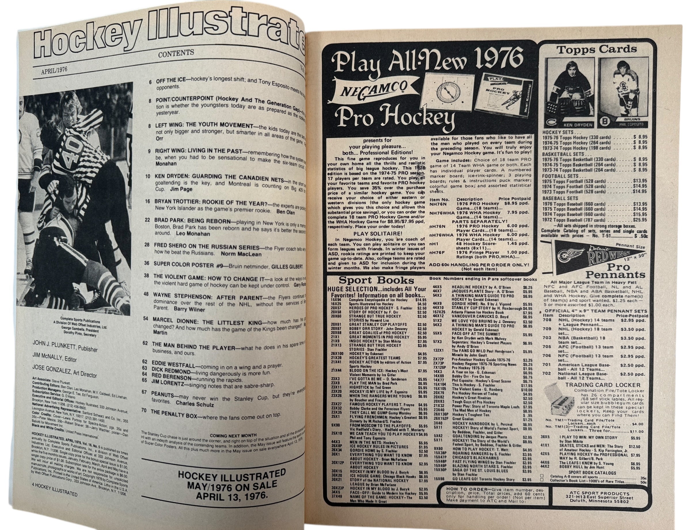 Open book with hockey-themed pages featuring text and images of hockey players and cards.