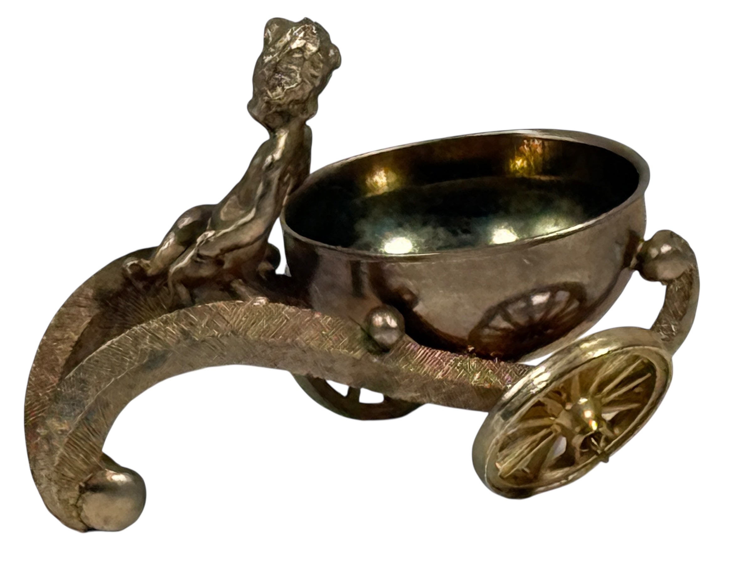 Bronze decorative item resembling a chariot with a bowl on a white background