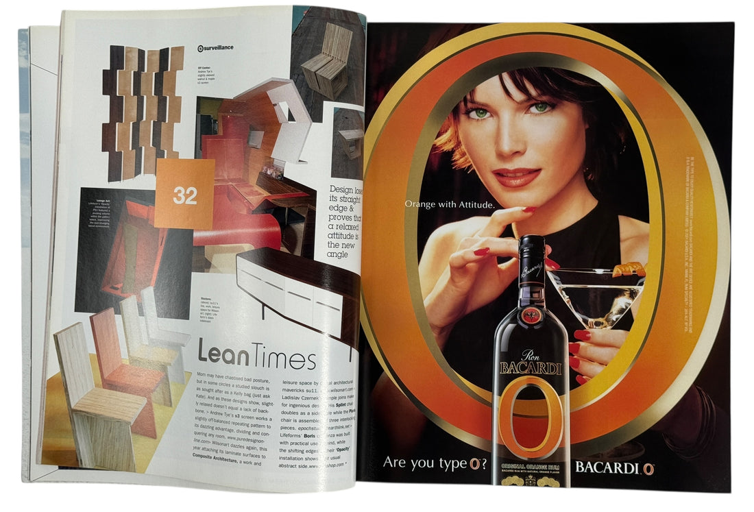 Open magazine with interior design layout and Bacardi advertisement featuring a woman with a cocktail.