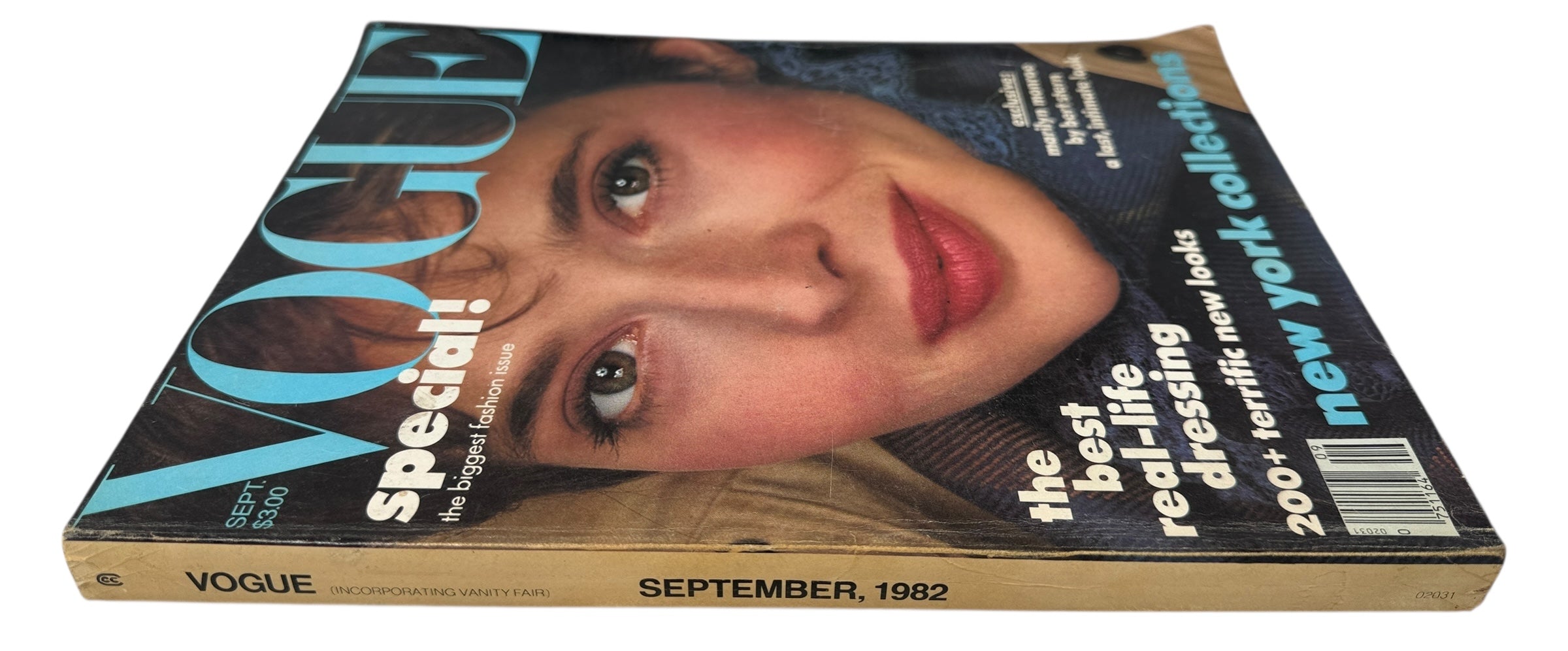 Vintage Vogue magazine from September 1982 with a cover featuring a woman's face.