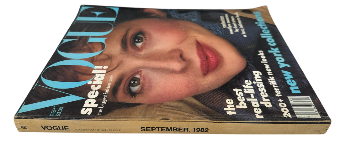 Vintage Vogue magazine from September 1982 with a cover featuring a woman's face.