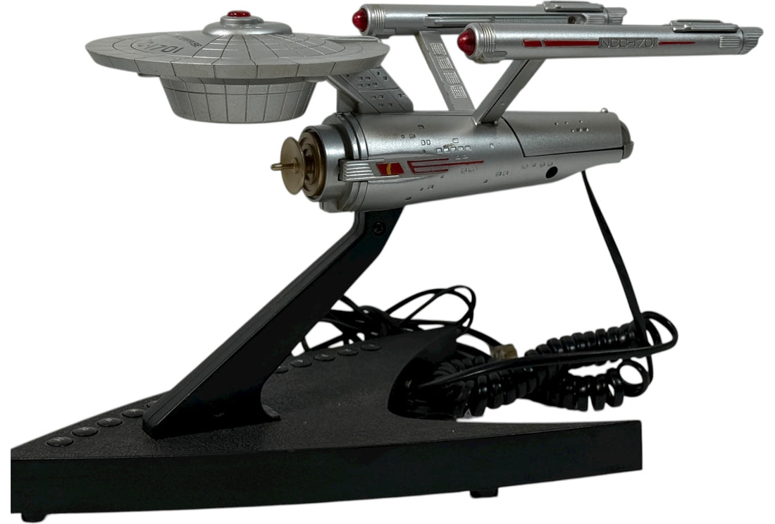 Official 1993 Telemania Star Trek USS Enterprise corded phone. Iconic NCC-1701 design, collectible display piece for Trekkies. Works and looks great.