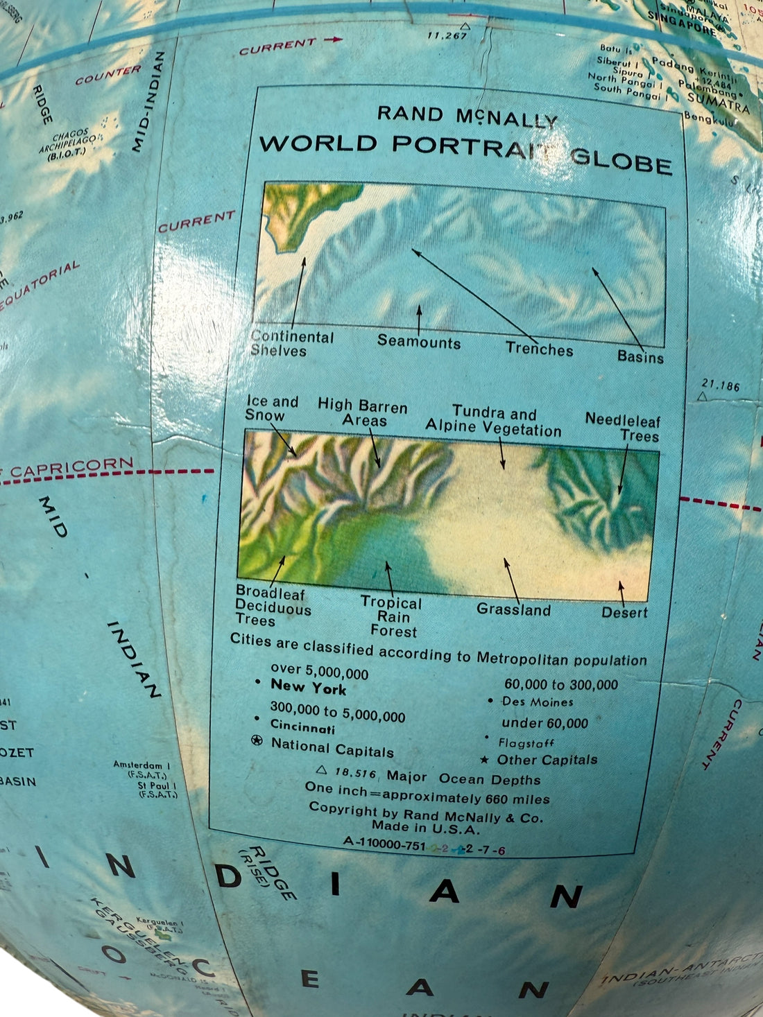 Vintage 1990 Rand McNally raised relief world globe showing USSR and unified Germany — Cold War era map with textured terrain and metal stand, Made in USA.