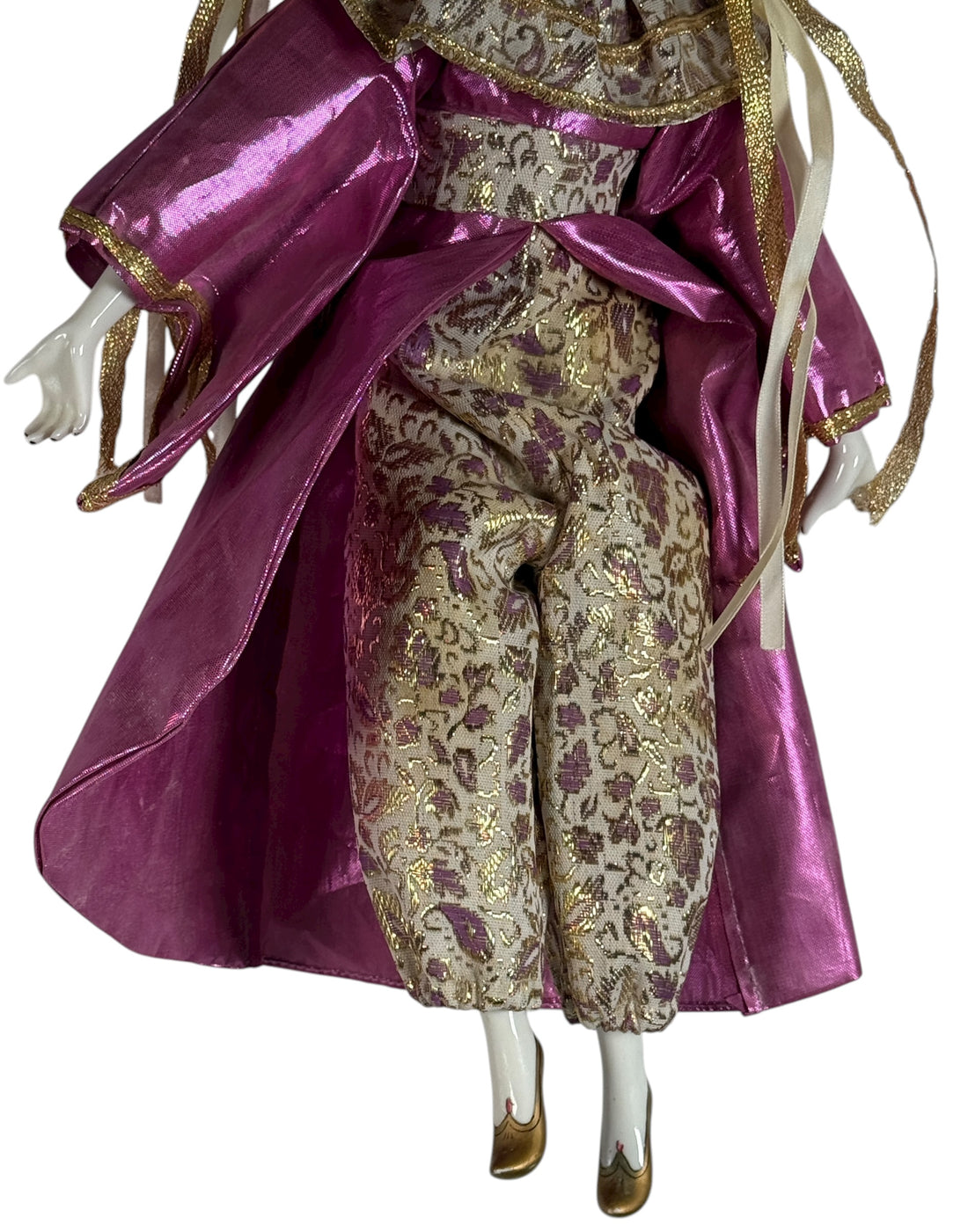 Vintage 18″ porcelain jester doll with mint satin and brocade costume. Elegant décor piece with porcelain head, hands, and feet.