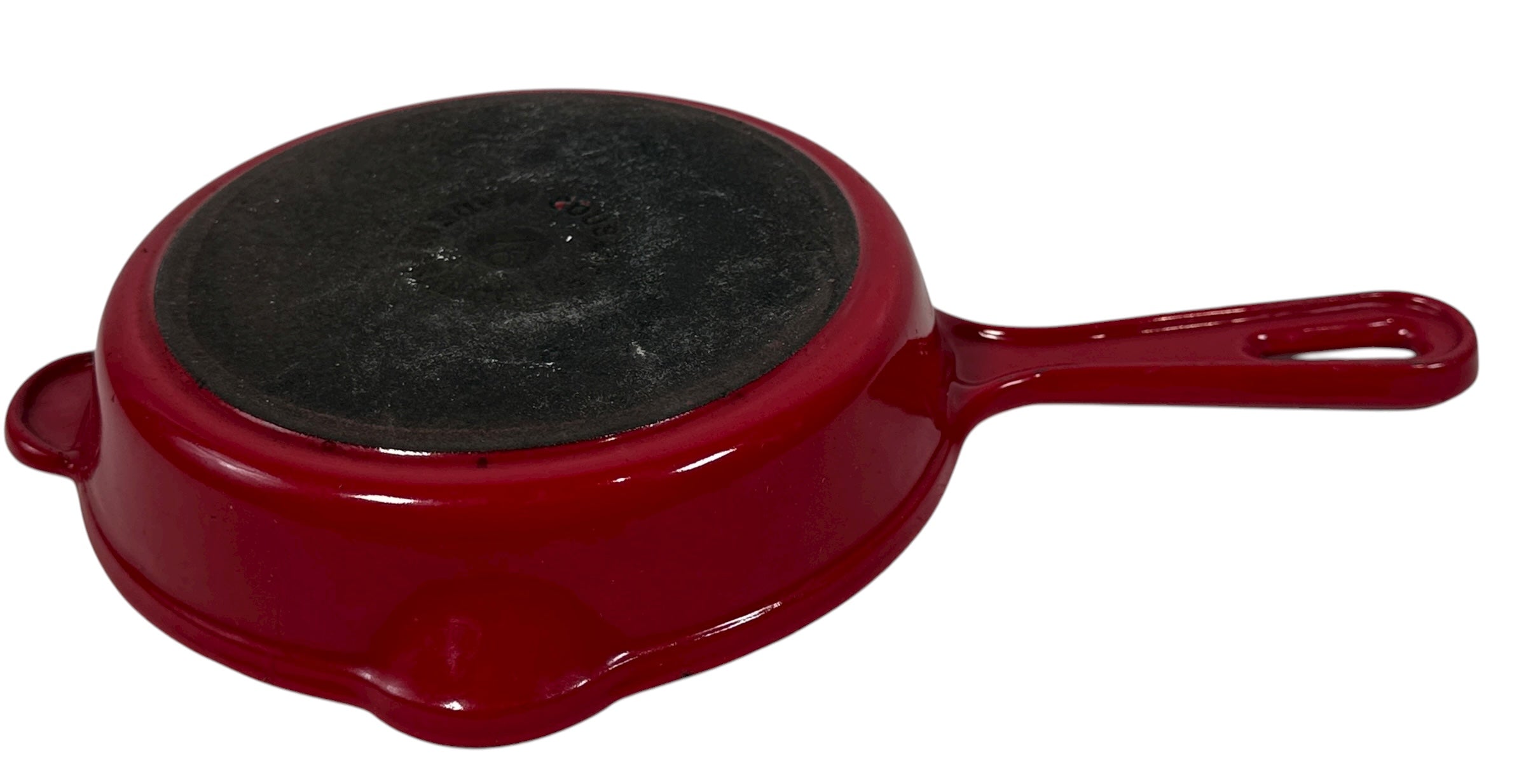 Vintage Cousances Le Creuset #16 enameled cast iron skillet in Flame red. French-made, functional with vintage wear. Great for cooking or display.
