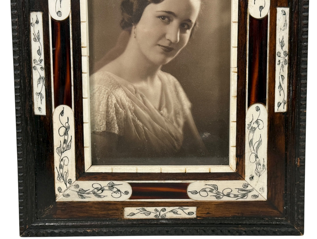 Mid-century Indian bone and horn inlay frame with hand-painted floral panels. Authentic materials, vintage patina, 1950s–70s craftsmanship. Great decor piece.