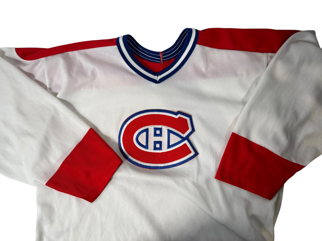 Vintage 1990s CCM Montréal Canadiens hockey jersey. Classic Habs colours, made in Canada. Clean condition. Ideal for fans and collectors.