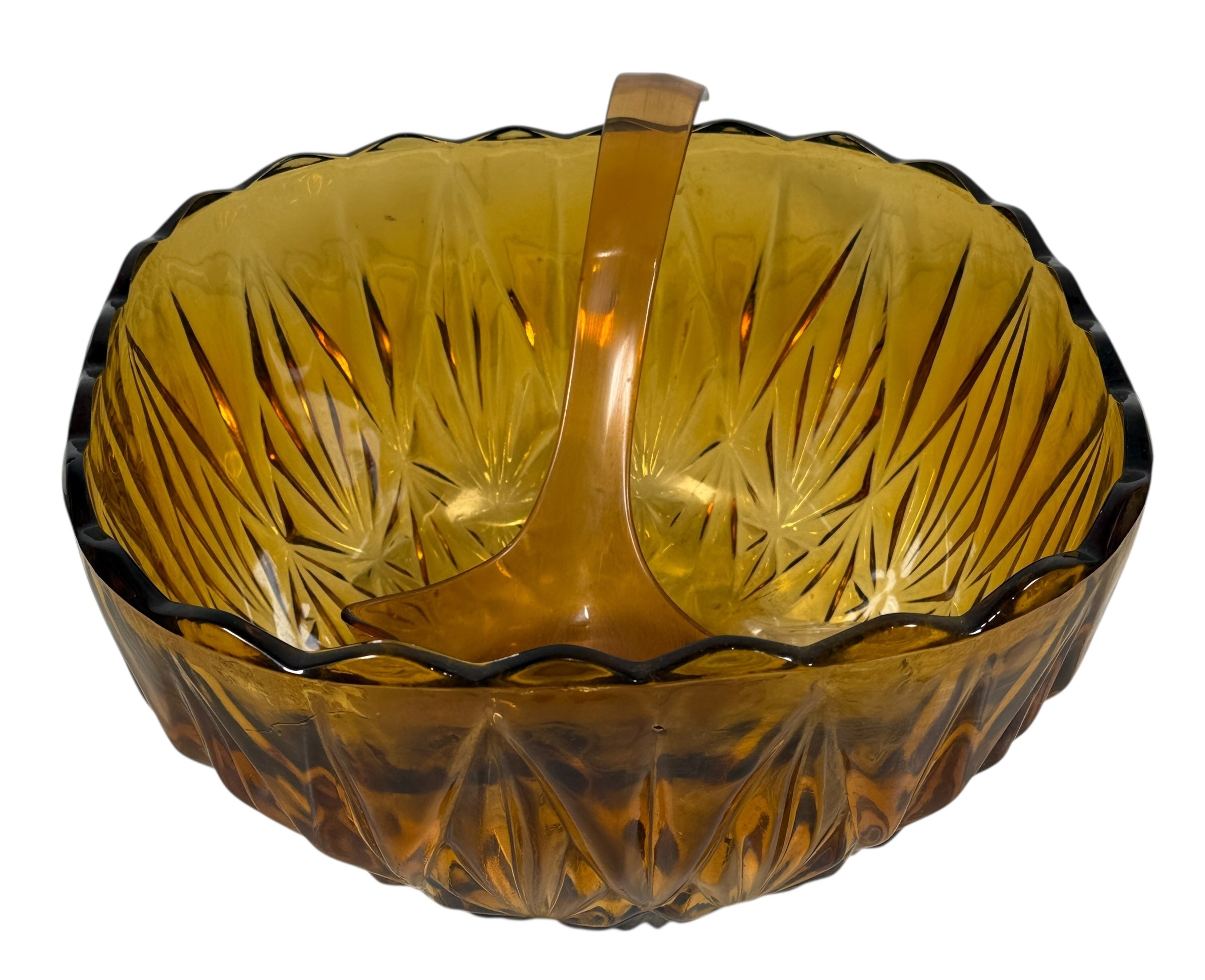 Vintage mid-century amber glass punch bowl set with cups and ladle. Classic starburst pattern, complete set, perfect for retro entertaining.