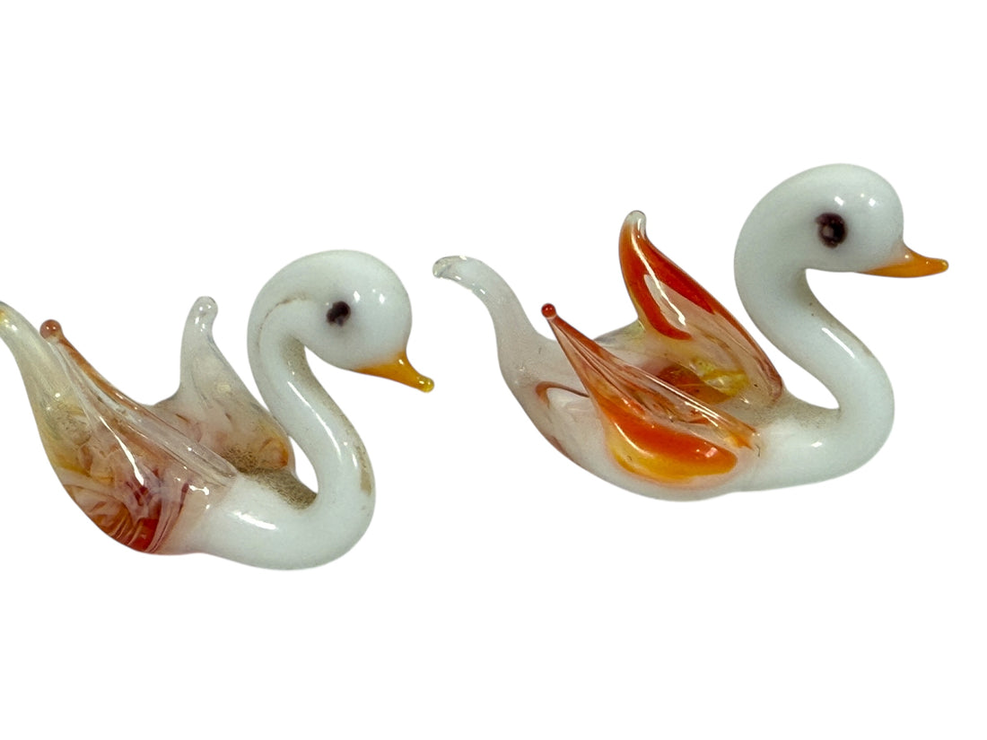 Murano-style art glass swan family set with opaline bodies and amber wings. Decorative 5-piece vintage-style glass display.
