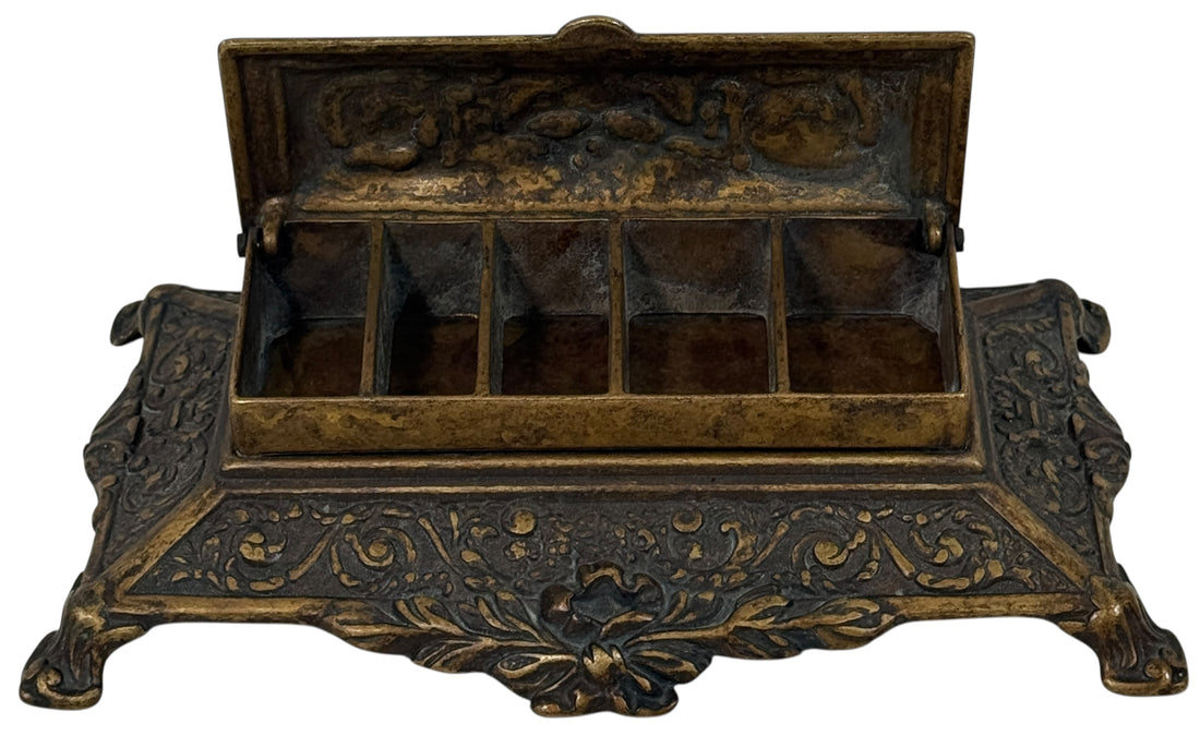 Vintage Italian cast metal desk stamp box in antique Victorian style with divided interior and aged bronze finish. Decorative postal desk accessory.