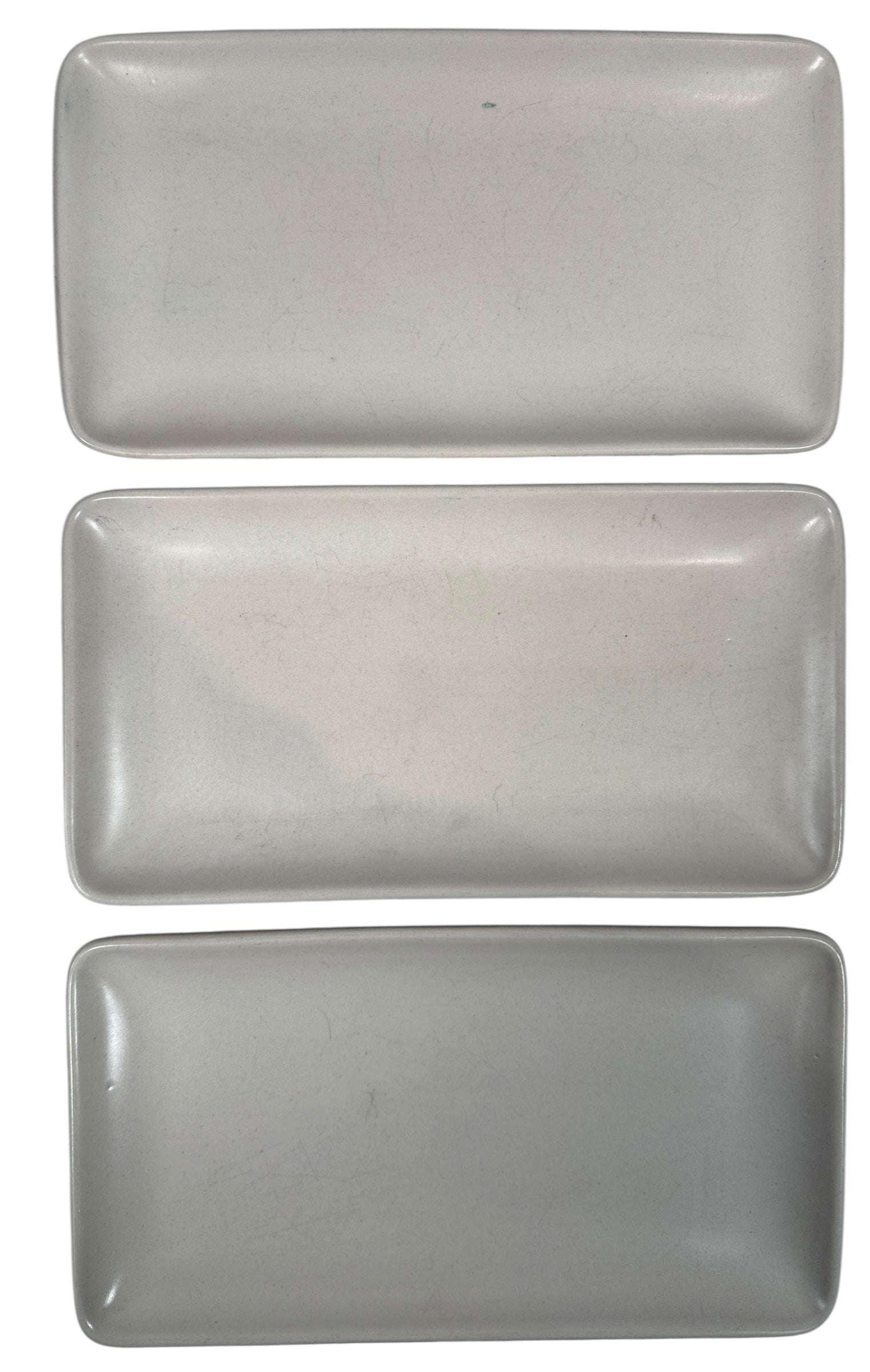 Heath Ceramics 7-piece stoneware serving set with modern matte white glaze. Restaurant-grade California design. Durable and collectible modern tableware.