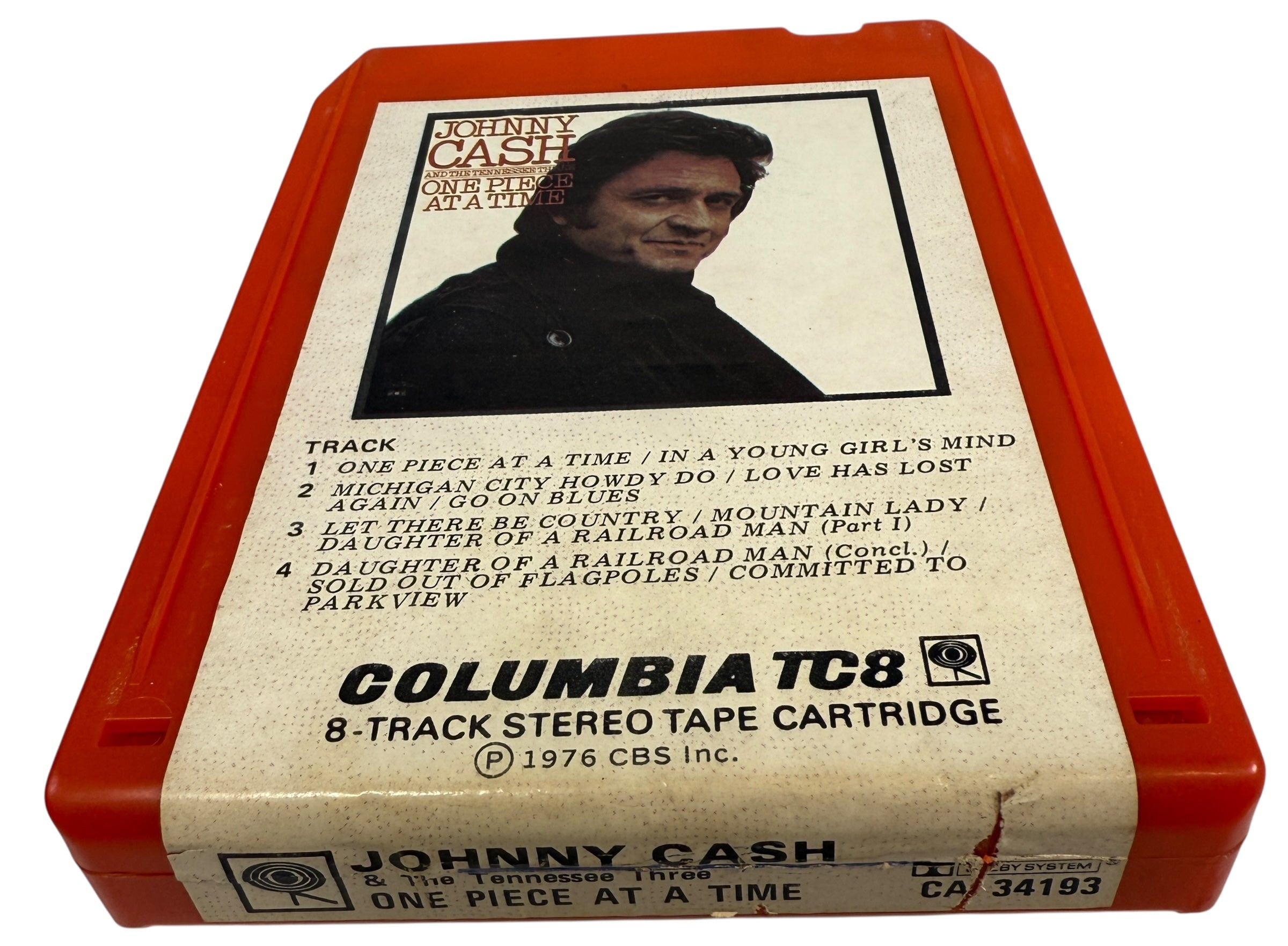1976 Johnny Cash One Piece at a Time Columbia TC8 8-track tape. Red shell, clean label, collectible outlaw country format. Vintage audio for fans and collectors.