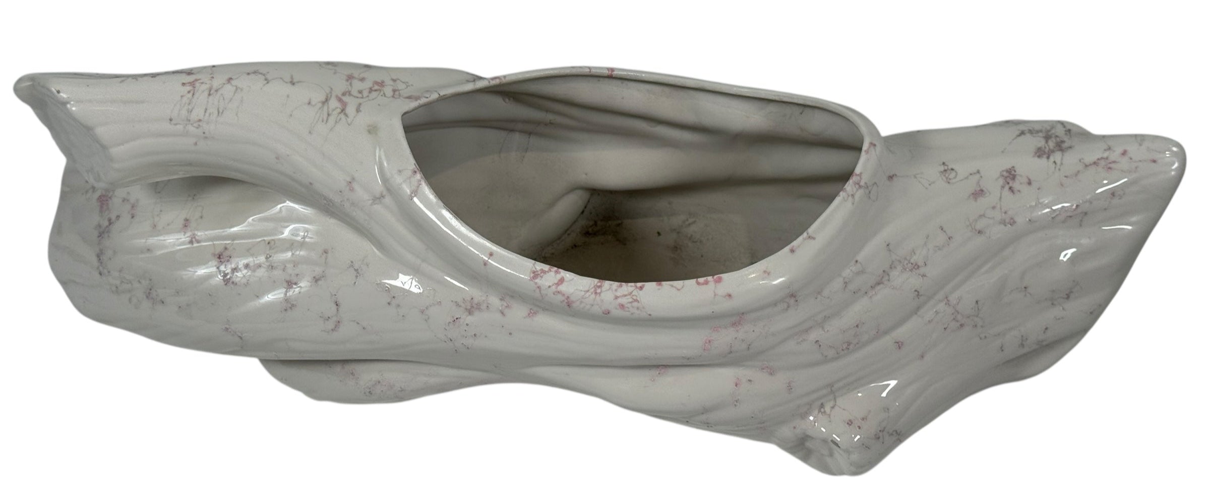 Ceramic turtle planter with textured surface on a white background