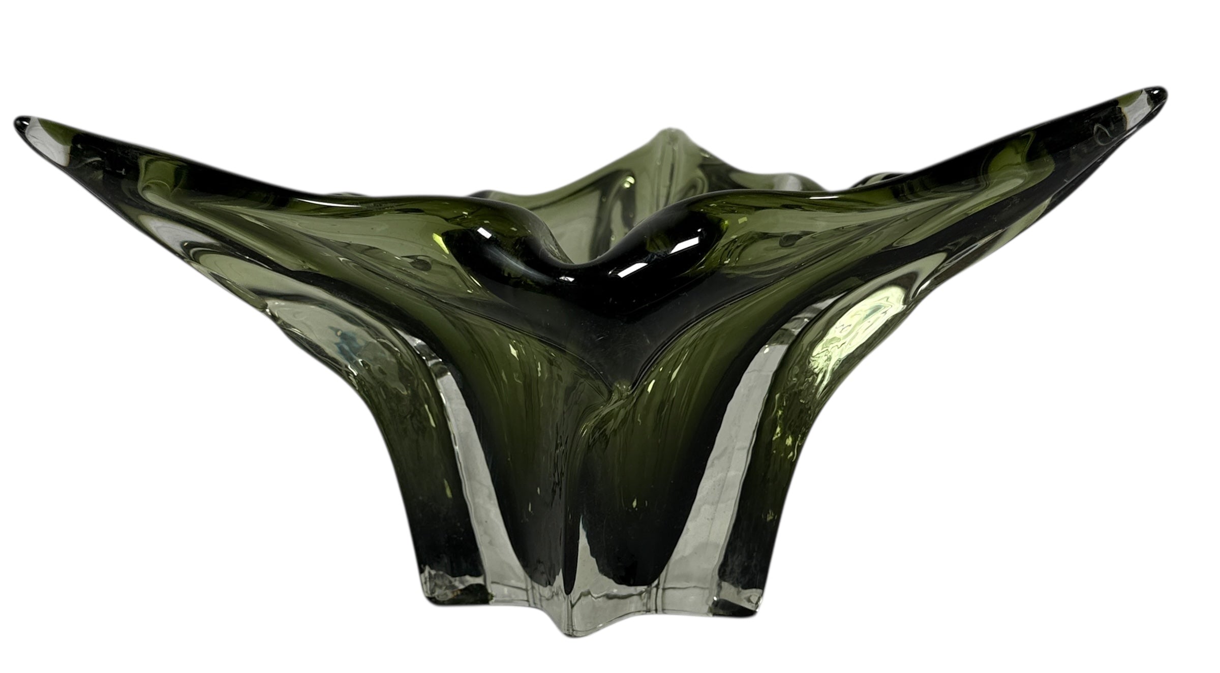 Chalet  Green glass bowl with wavy design on a white background