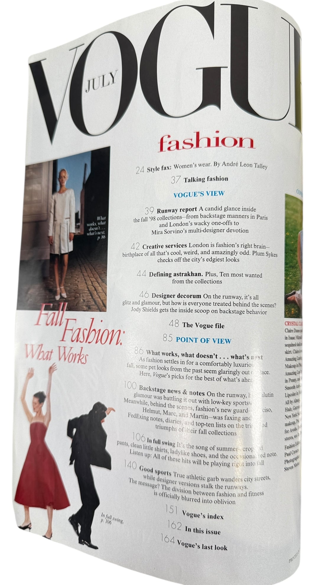 Vogue July 1998  magazine cover featuring a woman in a blue dress with text about fashion and lifestyle topics.