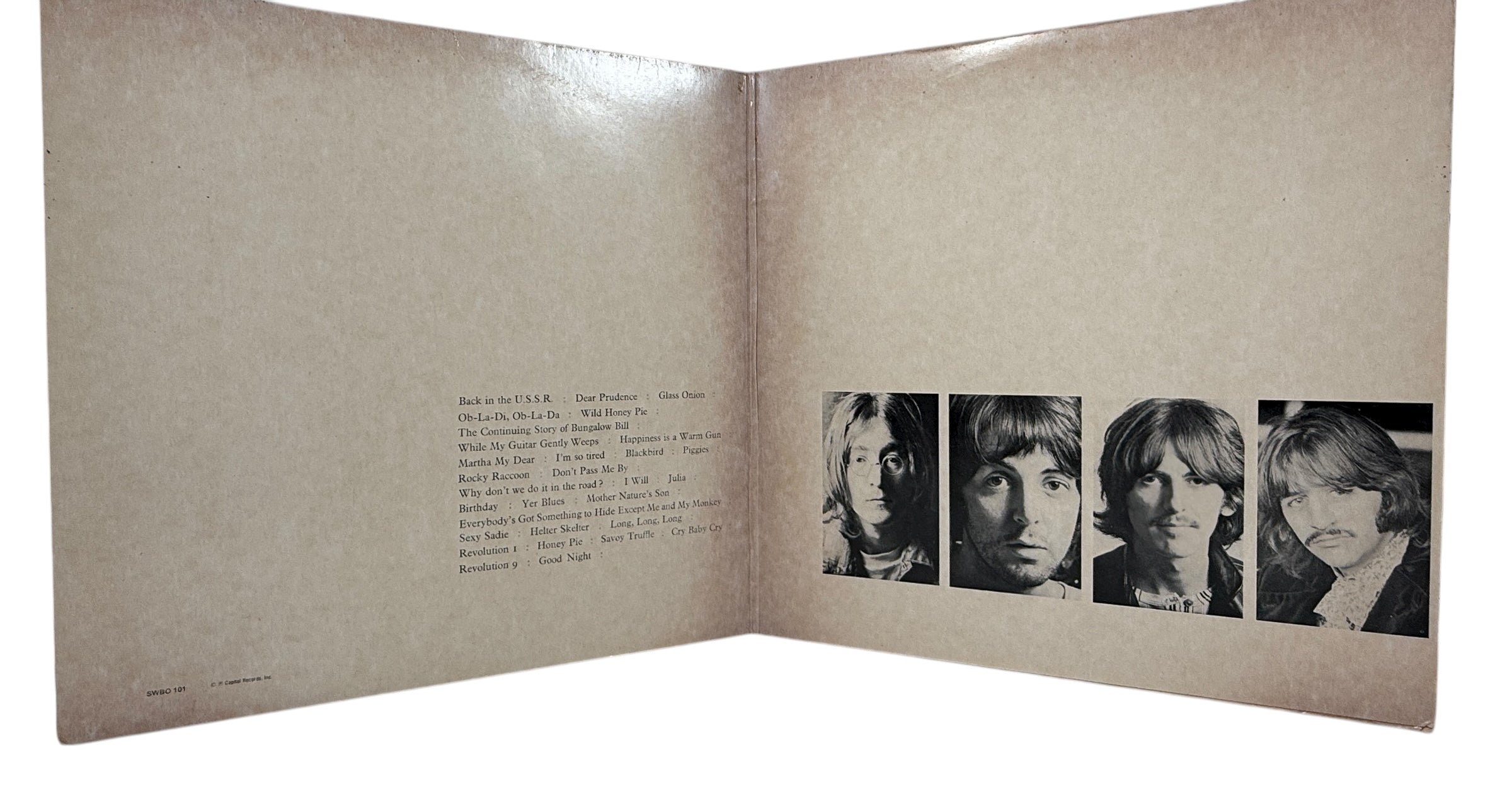 Complete Canadian pressing of The Beatles White Album with poster and all four photos. Classic SWBO-101 2LP set for collectors and vinyl fans.