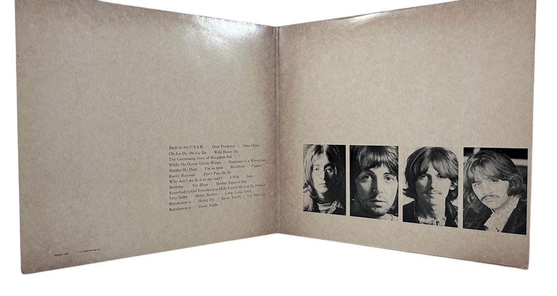 Complete Canadian pressing of The Beatles White Album with poster and all four photos. Classic SWBO-101 2LP set for collectors and vinyl fans.