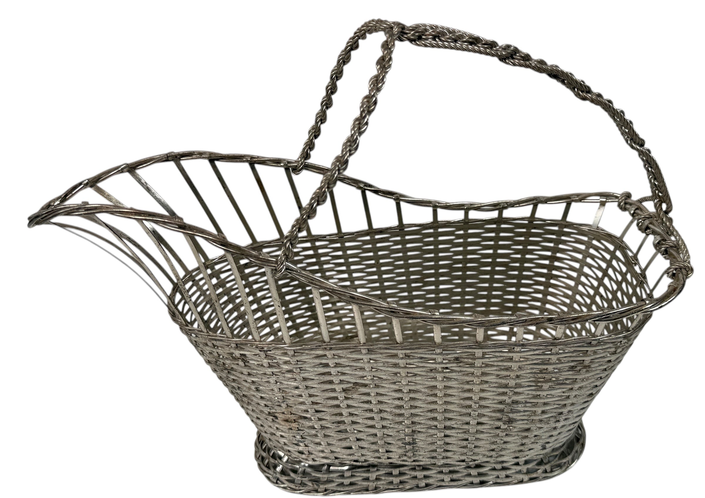 Wicker basket with a handle on a white background