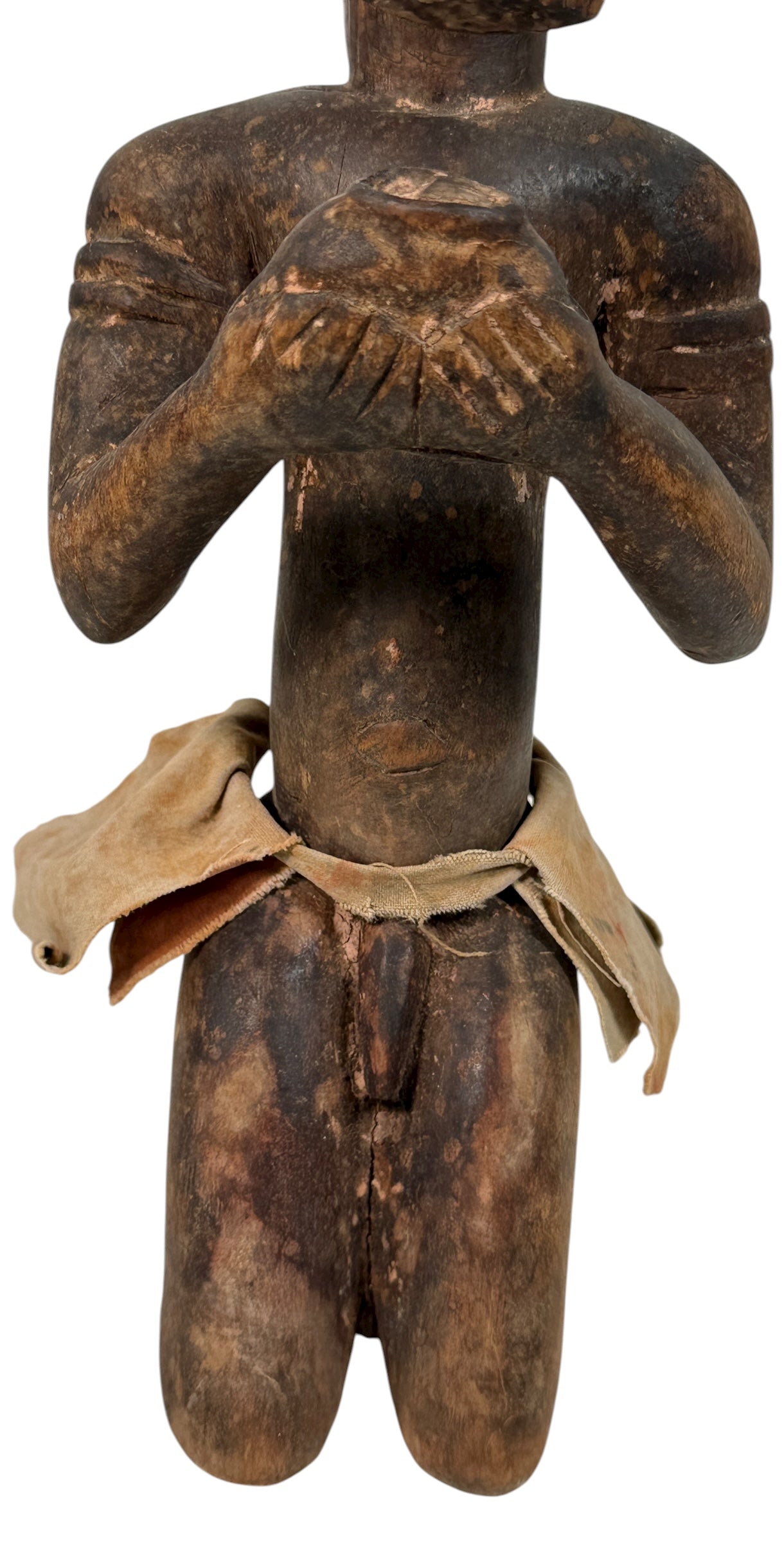Mid-century African Baule-style carved kneeling figure with aged patina and cloth wrap. Vintage West African sculpture, approx. 11 inches tall.