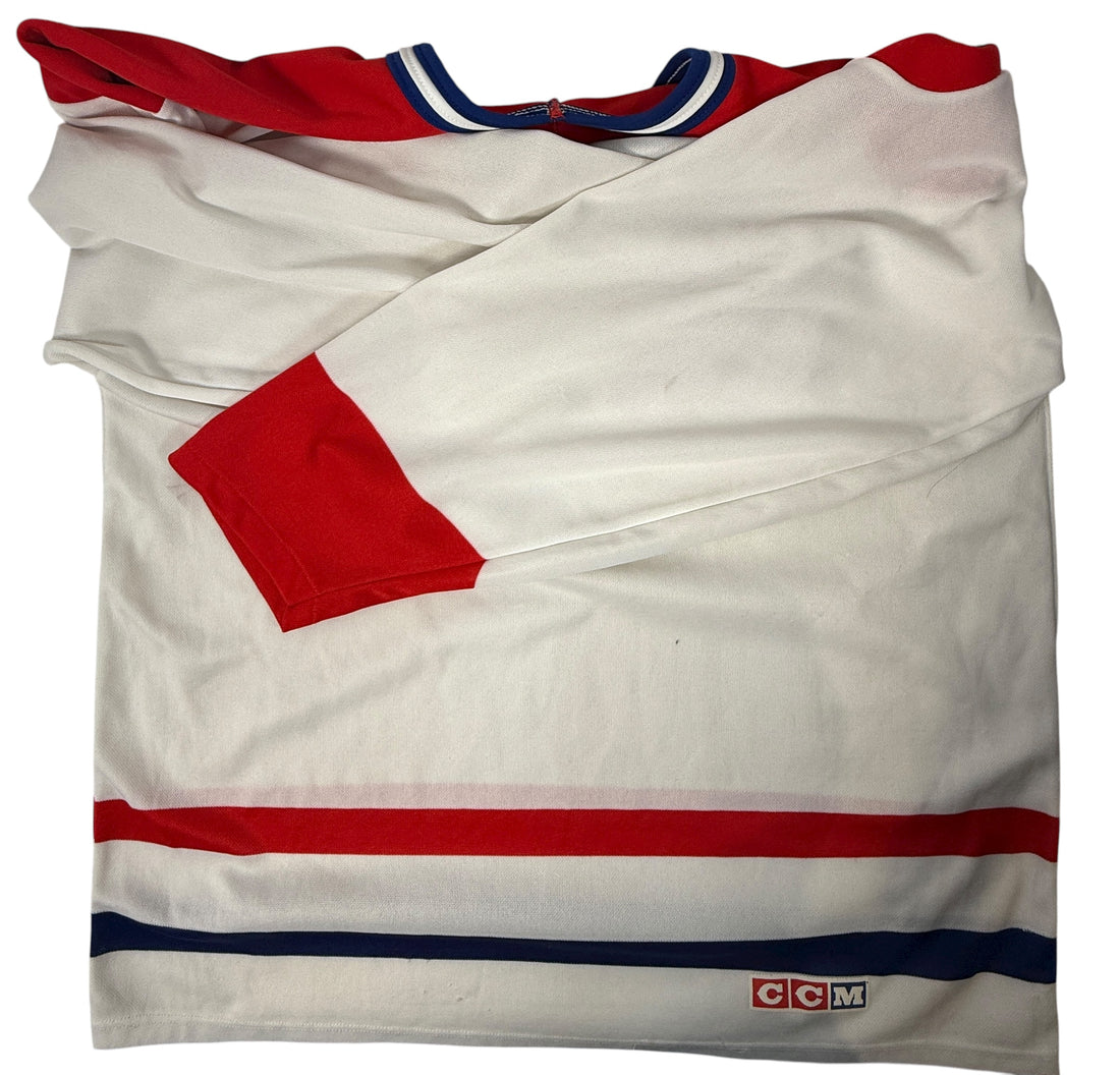Vintage 1990s CCM Montréal Canadiens hockey jersey. Classic Habs colours, made in Canada. Clean condition. Ideal for fans and collectors.