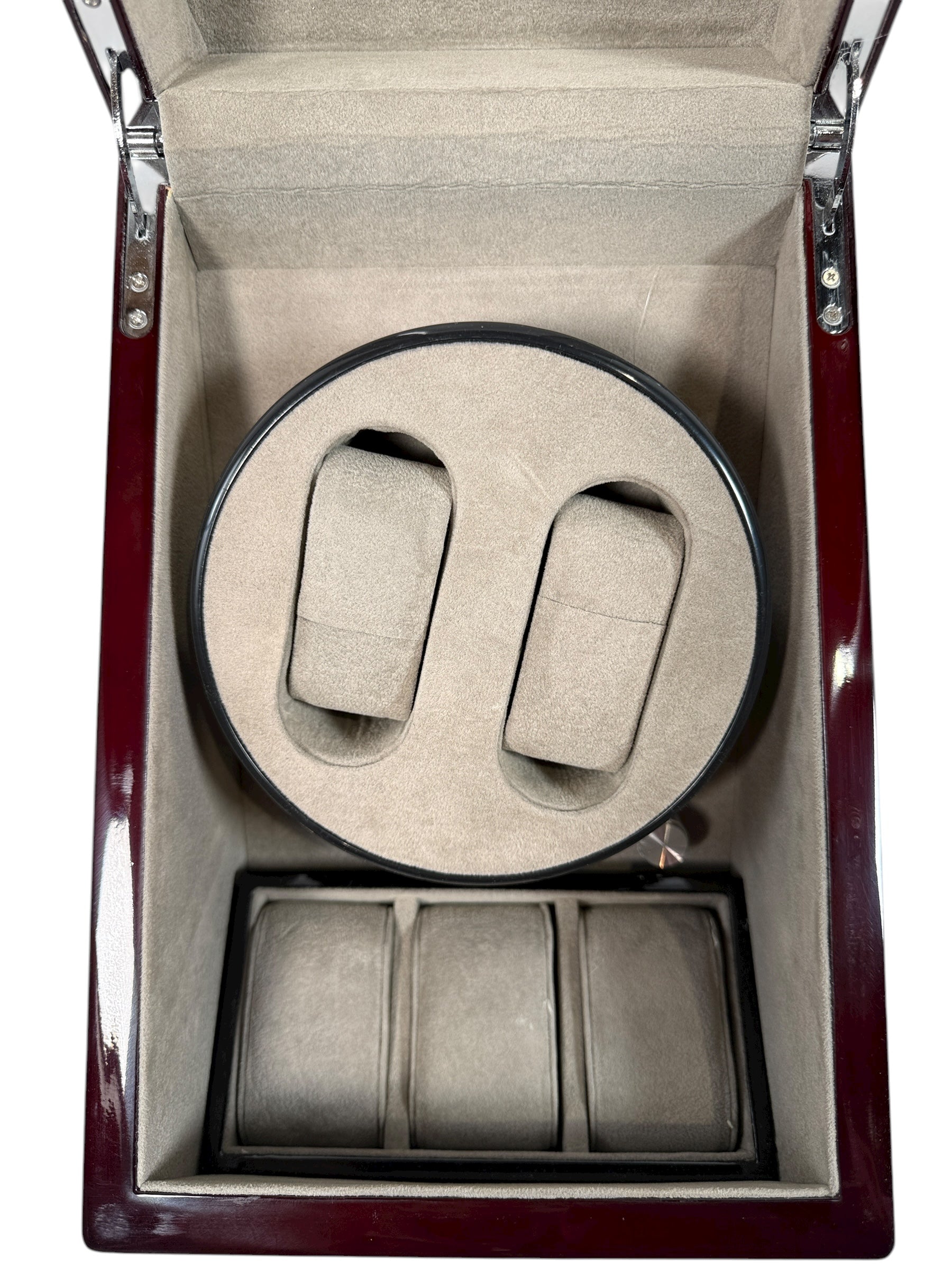 Working dual automatic watch winder in piano black lacquer with storage, display lid, and AC adaptor. Clean, functional, and perfect for protecting your watches.