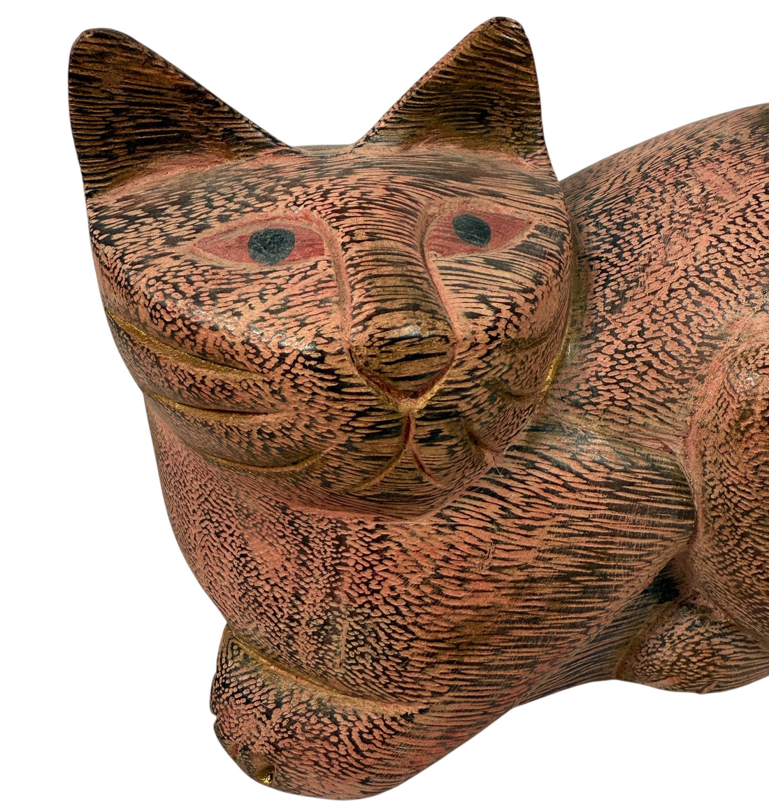 Hand-carved wooden cat sculpture in folk art style. Solid wood, decorative carved texture, warm natural finish. Unique décor piece for cat lovers.