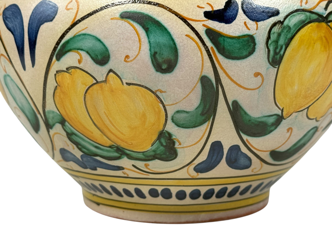 Hand-painted Spanish ceramic planter in blue and yellow majolica style. Vintage decorative cachepot with folk-art charm, ideal for plants or display.