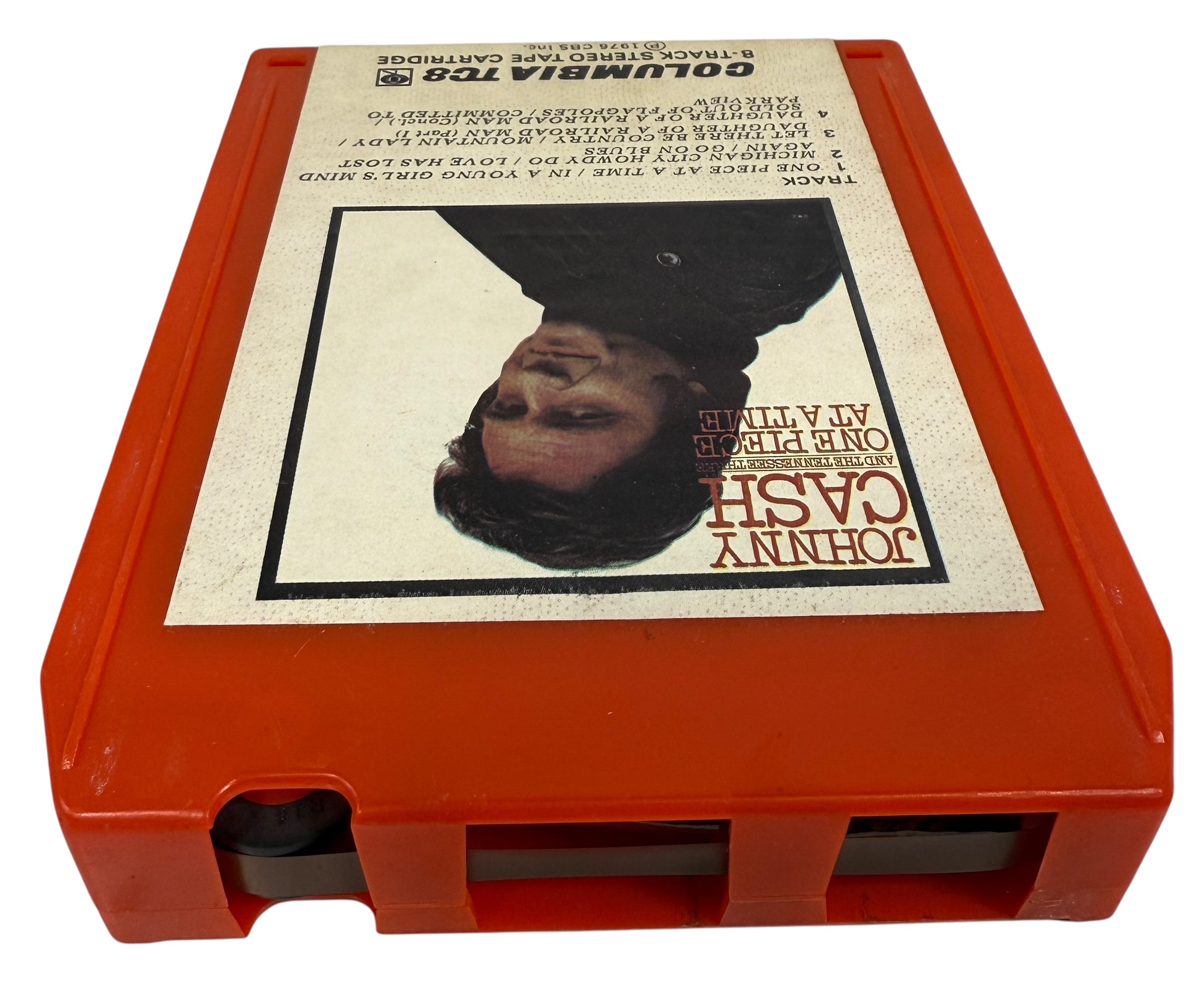 1976 Johnny Cash One Piece at a Time Columbia TC8 8-track tape. Red shell, clean label, collectible outlaw country format. Vintage audio for fans and collectors.