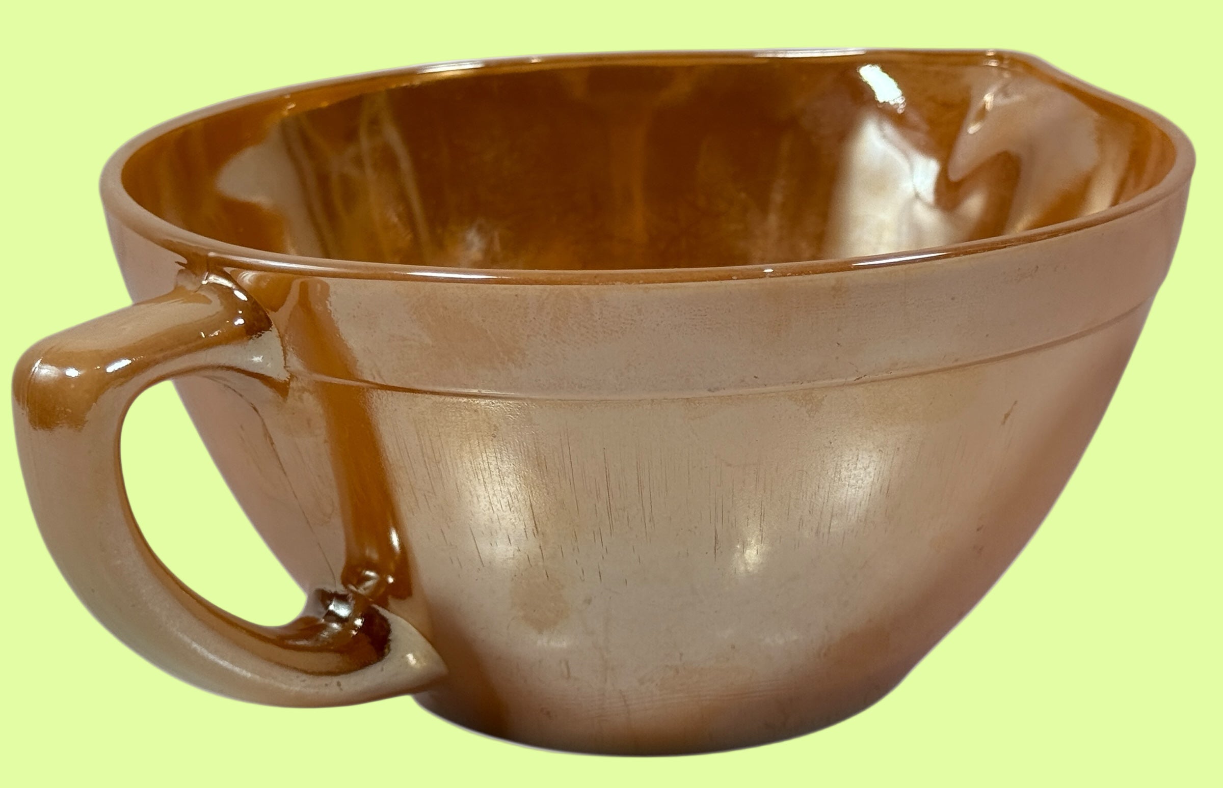 Vintage Fire-King Peach Luster mixing bowl with handle &amp; spout. Classic 1950s oven-proof milk glass collectible. Perfect for retro kitchens or display.